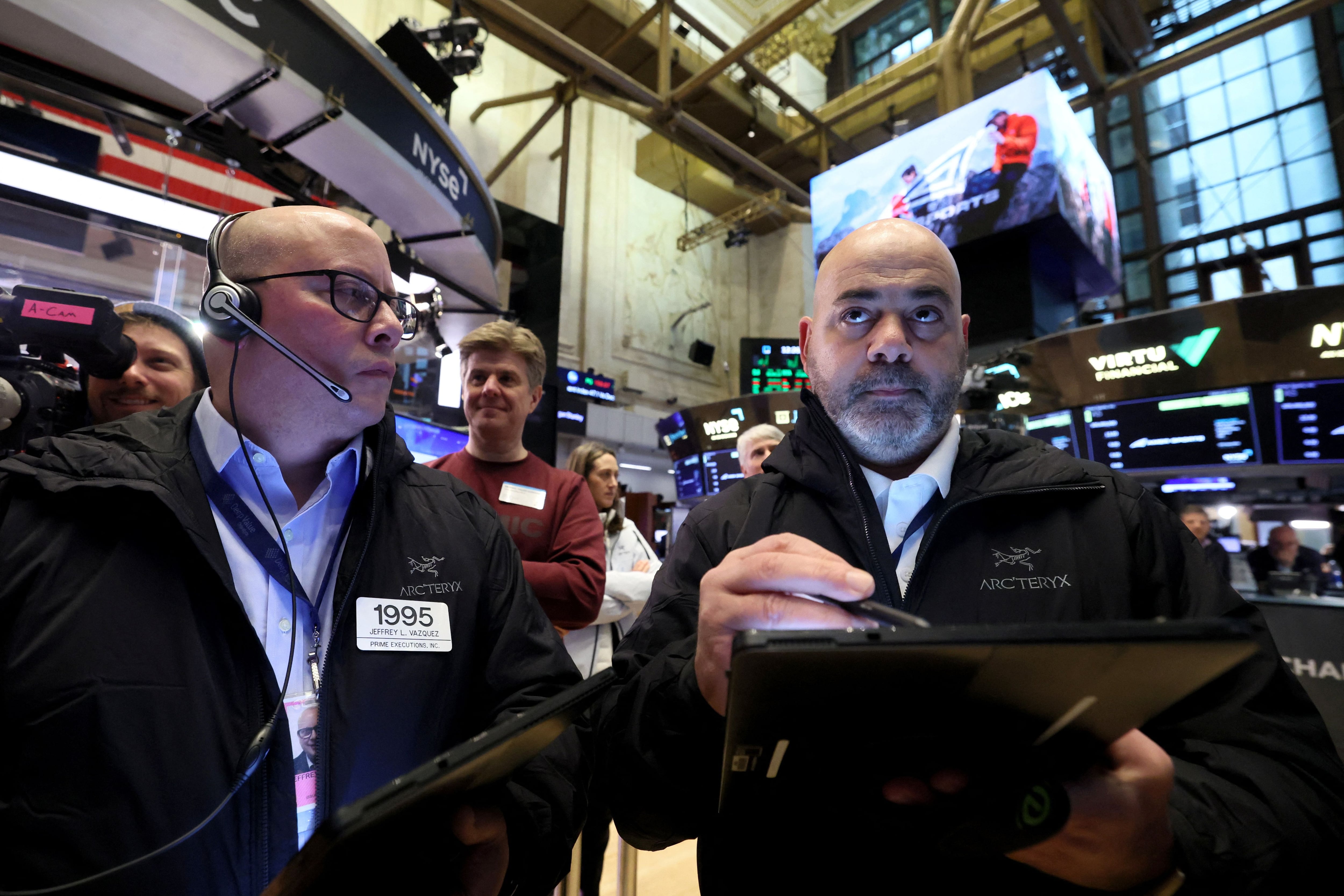 Traders work on the floor at the New York Stock Exchange (NYSE) in New York City, U.S., February 1, 2024. REUTERS/Brendan McDermid