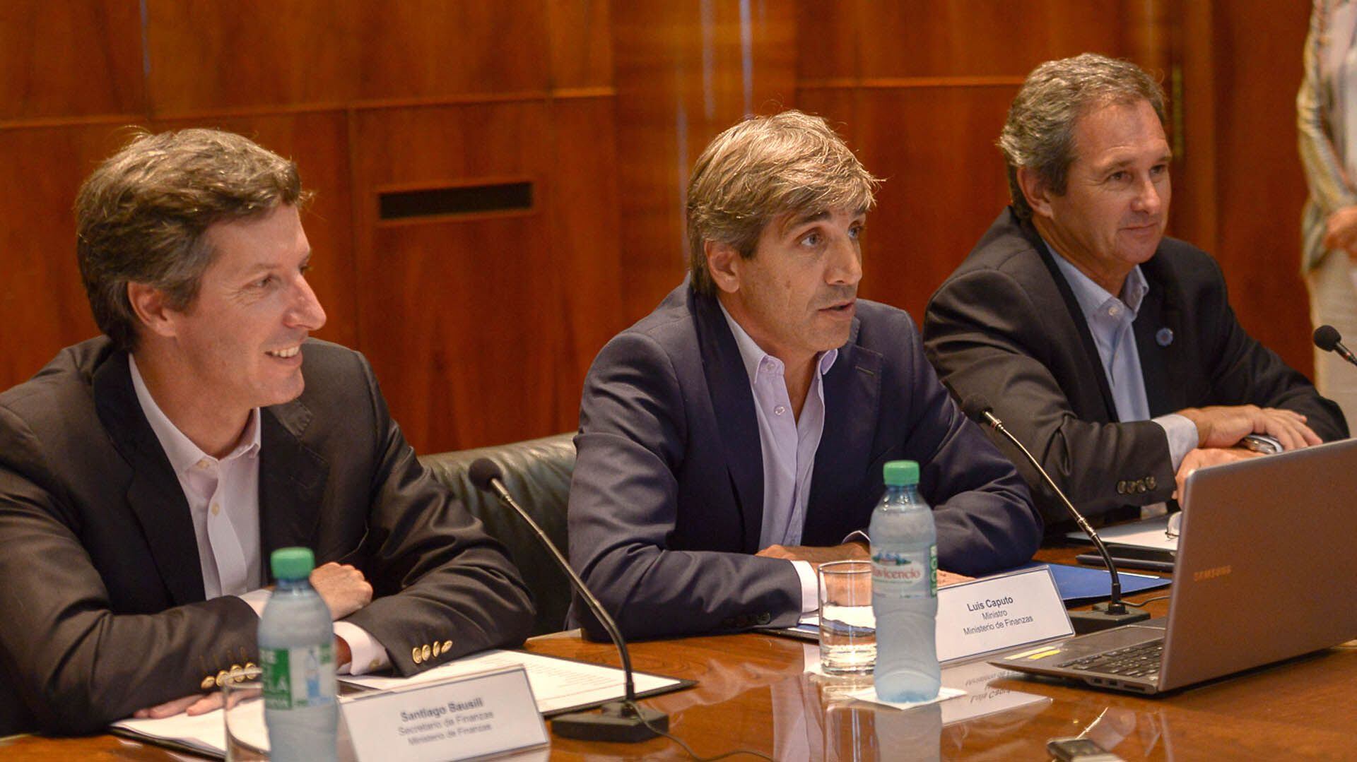 ​Santiago Bausili, Luis Caputo y Pablo Quirno 