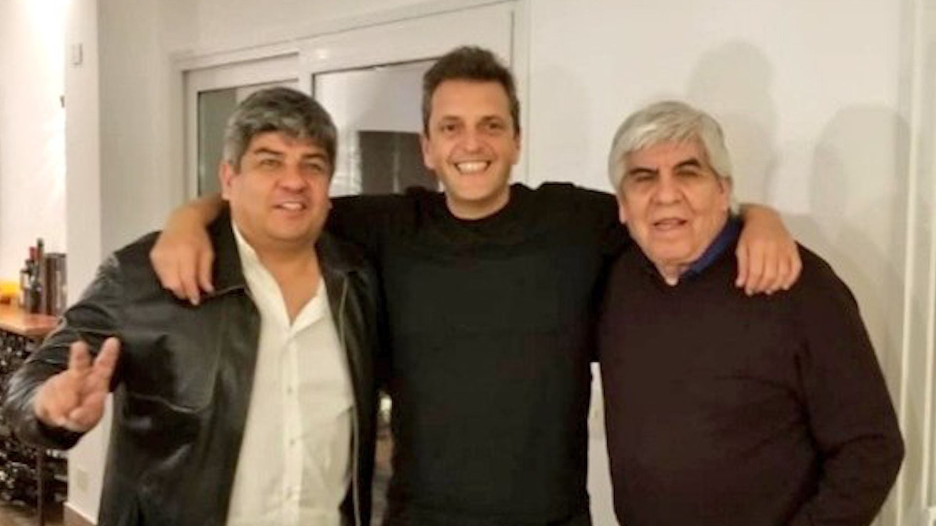 Sergio Massa, con Hugo y Pablo Moyano 