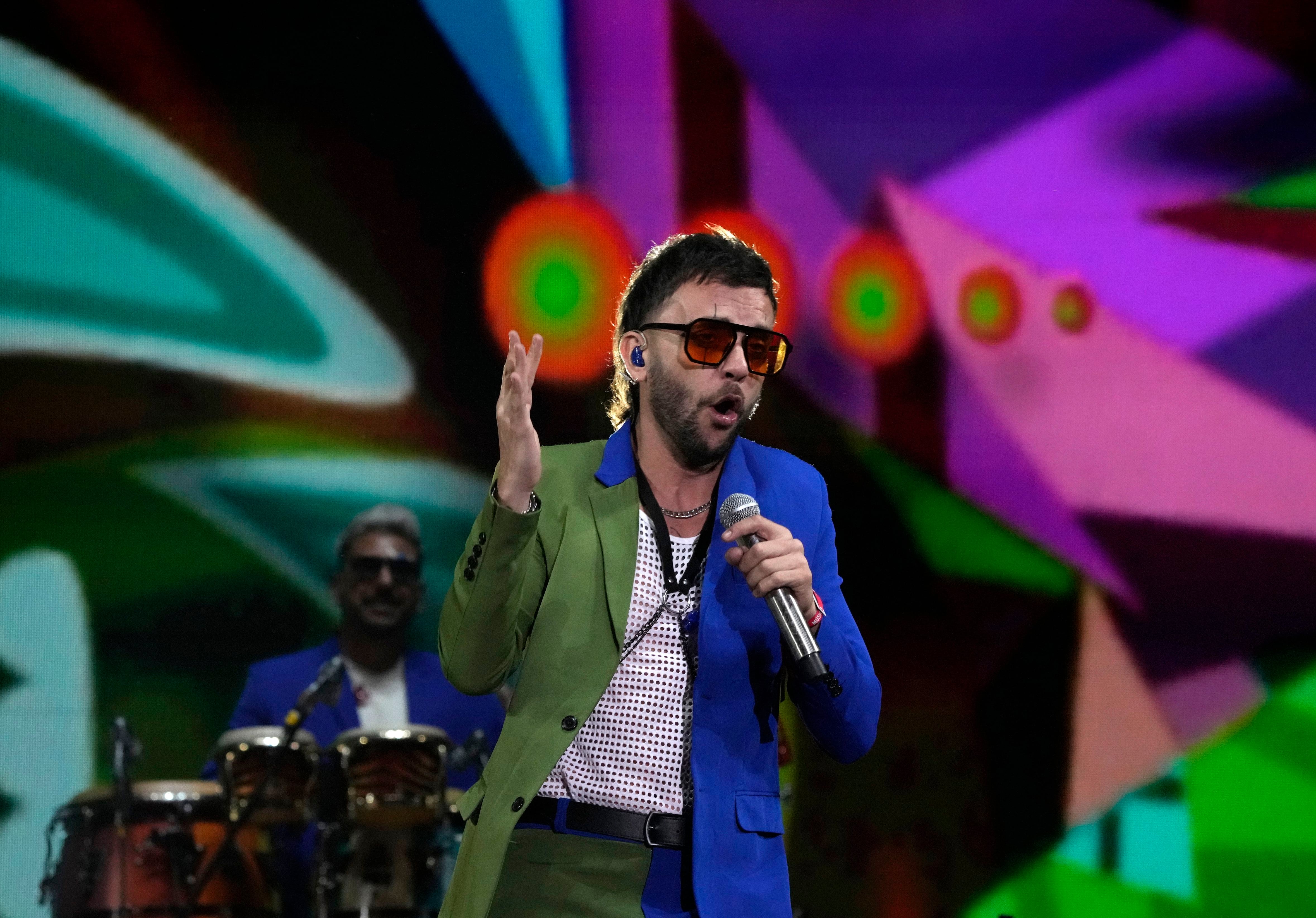 Los Caligaris durante su presentación en el festival Vive Latino en la Ciudad de México el sábado 18 de marzo de 2023. (Foto AP/Fernando Llano)