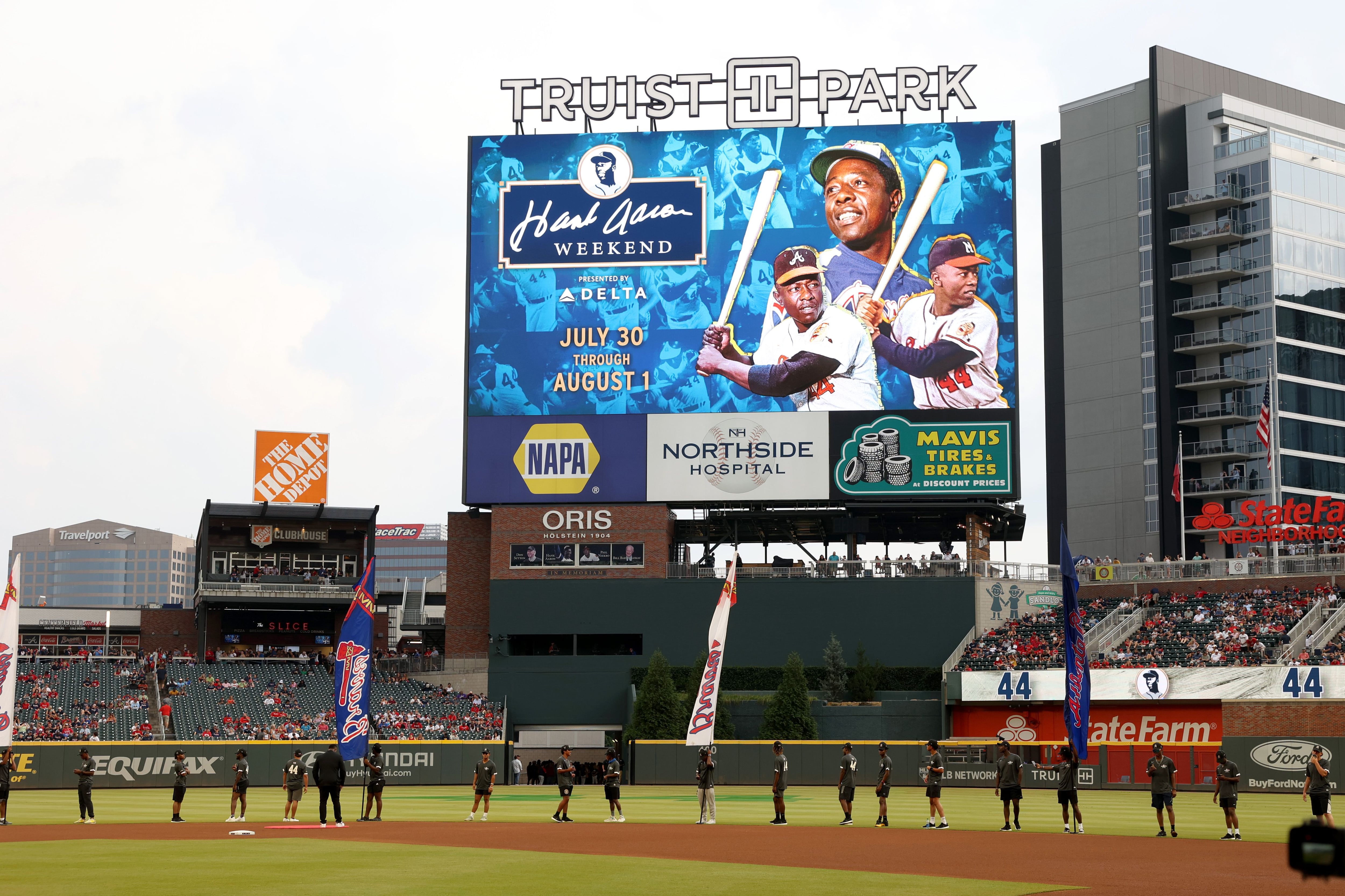 Jul 30, 2021; Atlanta, Georgia, USA; A special presentation is shown during the Hank Aaron weekend before the Atlanta Braves game against the Milwaukee Brewers at Truist Park. Mandatory Credit: Jason Getz-USA TODAY Sports