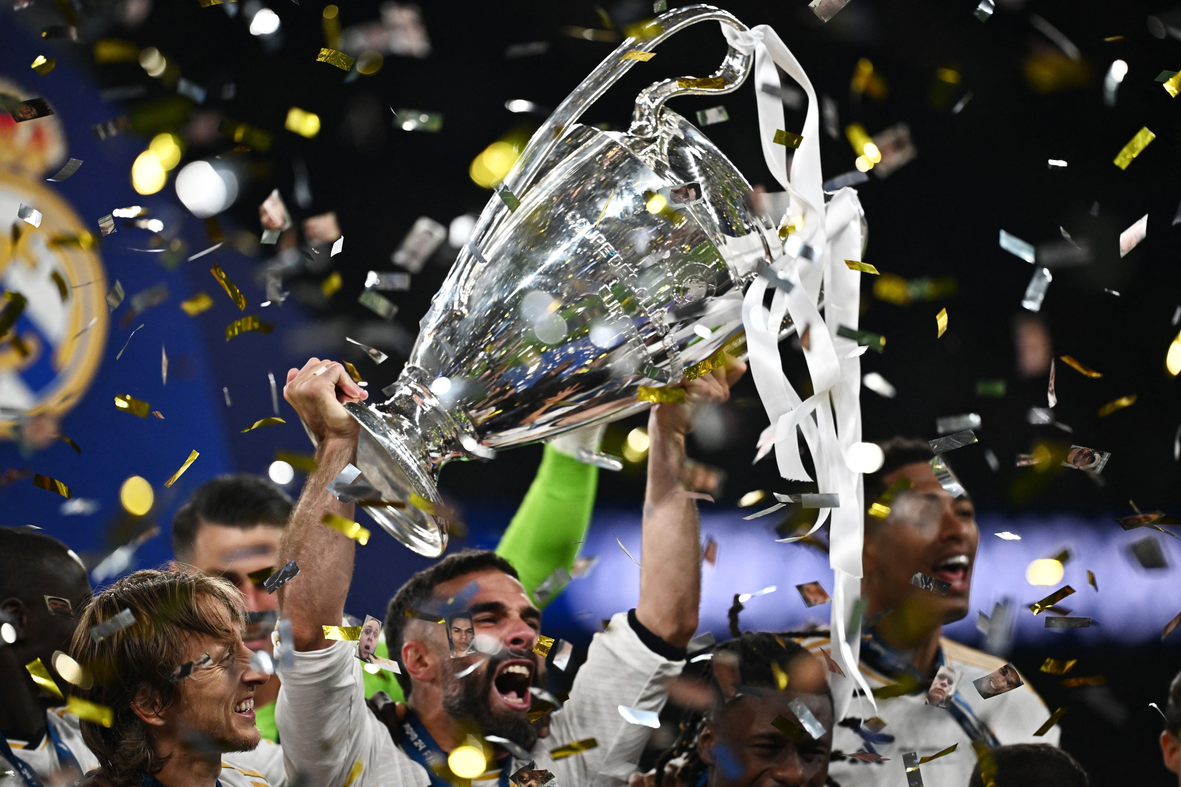 Soccer Football - Champions League - Final - Borussia Dortmund v Real Madrid - Wembley Stadium, London, Britain - June 1, 2024 Real Madrid's Dani Carvajal celebrates with the trophy after winning the Champions League REUTERS/Dylan Martinez