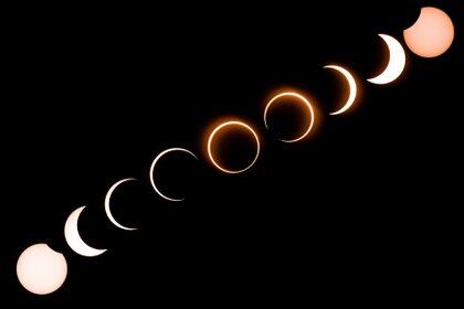 Composición fotográfica del eclipse de 2019 (Photo by Sadiq ASYRAF / AFP)
