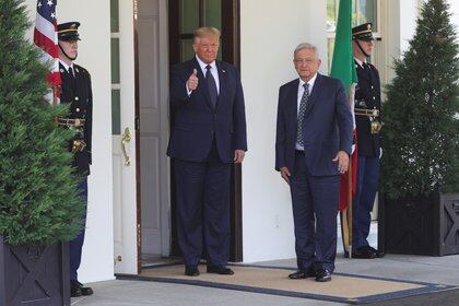 U.S. President Donald Trump welcomes Mexico’s President Andres Manuel Lopez Obrador as he arrives for meetings at the White House in Washington, U.S., July 8, 2020. REUTERS/Tom Brenner