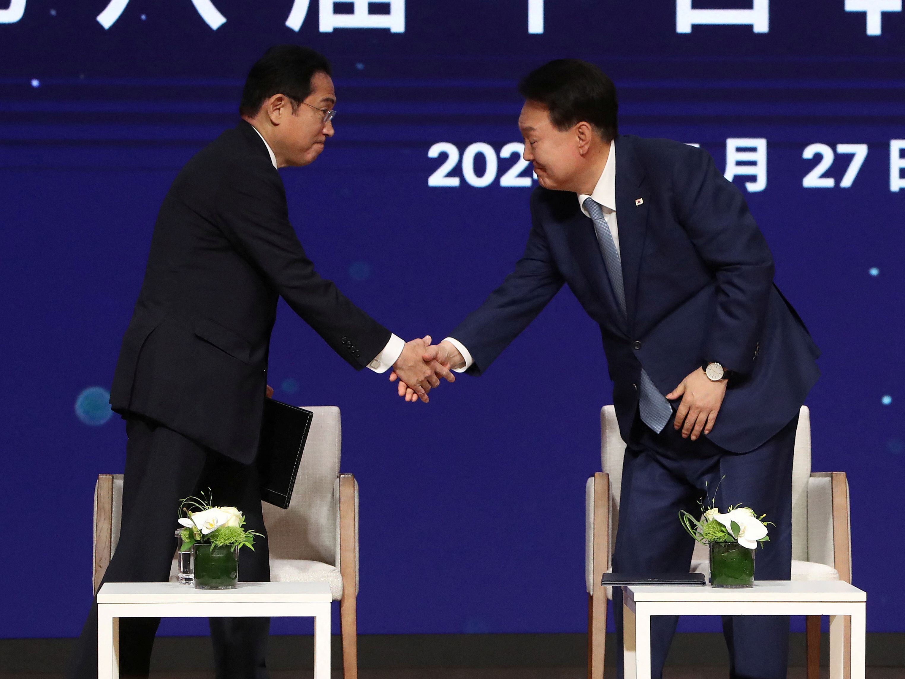 Japanese Prime Minister Fumio Kishida, South Korean President Yoon Suk Yeol and Chinese Premier Li Qiang attend the business summit at the Korea Chamber of Commerce and Industry on May 27, 2024 in Seoul, South Korea. Chung Sung-Jun/Pool via REUTERS