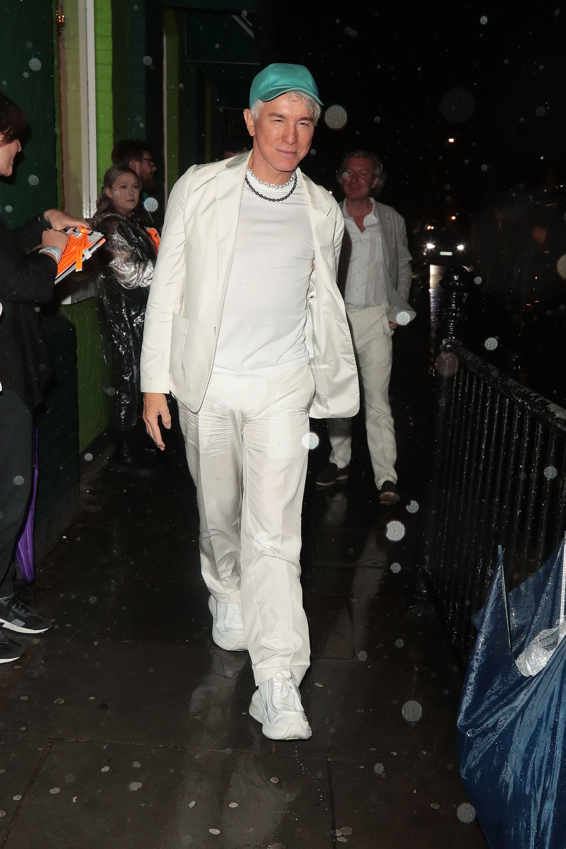 El actor australiano Baz Luhrmann, llegando al cumpleaños de Jagger  (Photo by Ricky Vigil M / Justin E Palmer/GC Images)