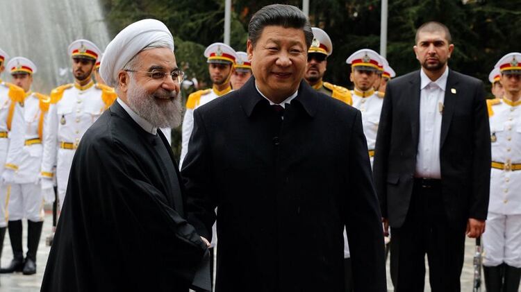 Xi Jinping y Hasan Rohani (AFP)