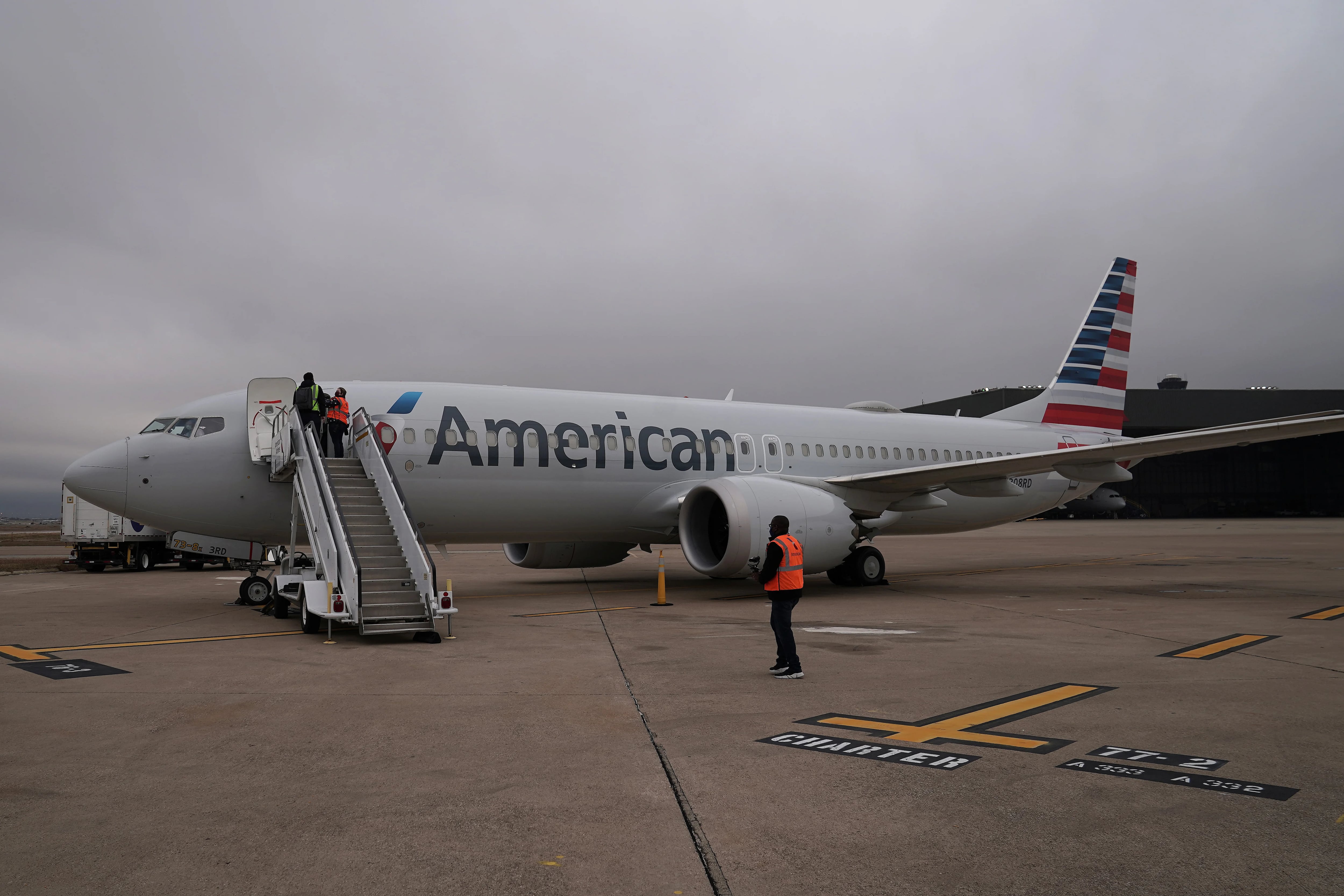 A Boeing 737 Max airplane is pictured on the tarmac at Dallas Fort Worth Airport before a media flight to Tulsa, Oklahoma in Dallas, Texas, U.S., December 2, 2020. REUTERS/Carlo Allegri