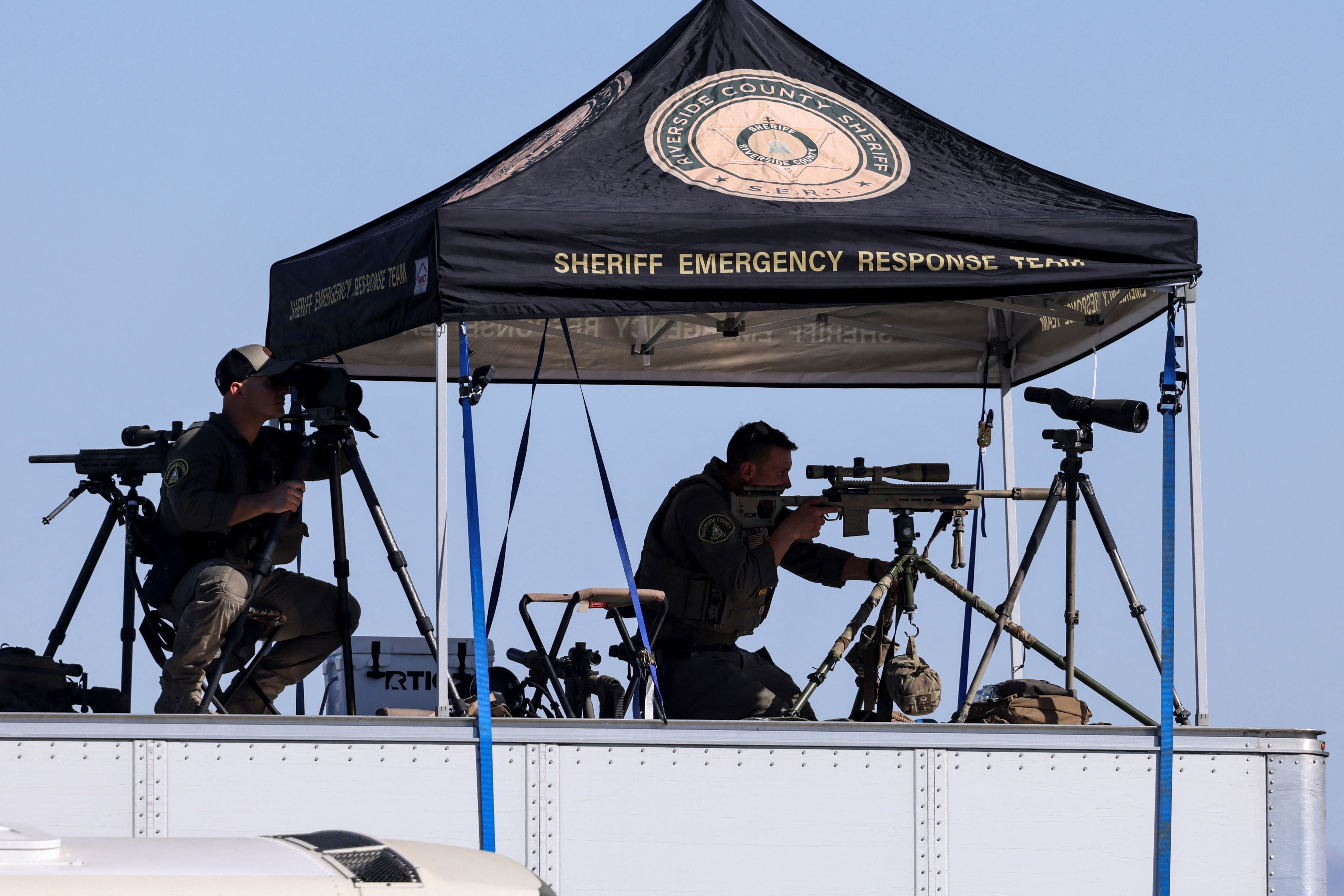 Counter snipers take position, on the day of a rally by Republican presidential nominee former U.S. President Donald Trump in Coachella, California, U.S., October 12, 2024. REUTERS/Mike Blake