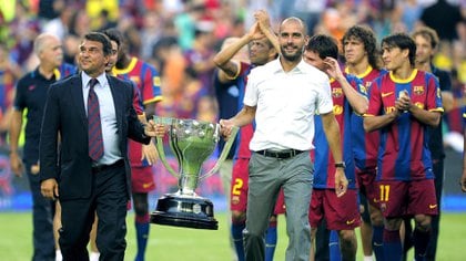 Guardiola llegó de la mano de Joan Laporta (Foto: AFP)