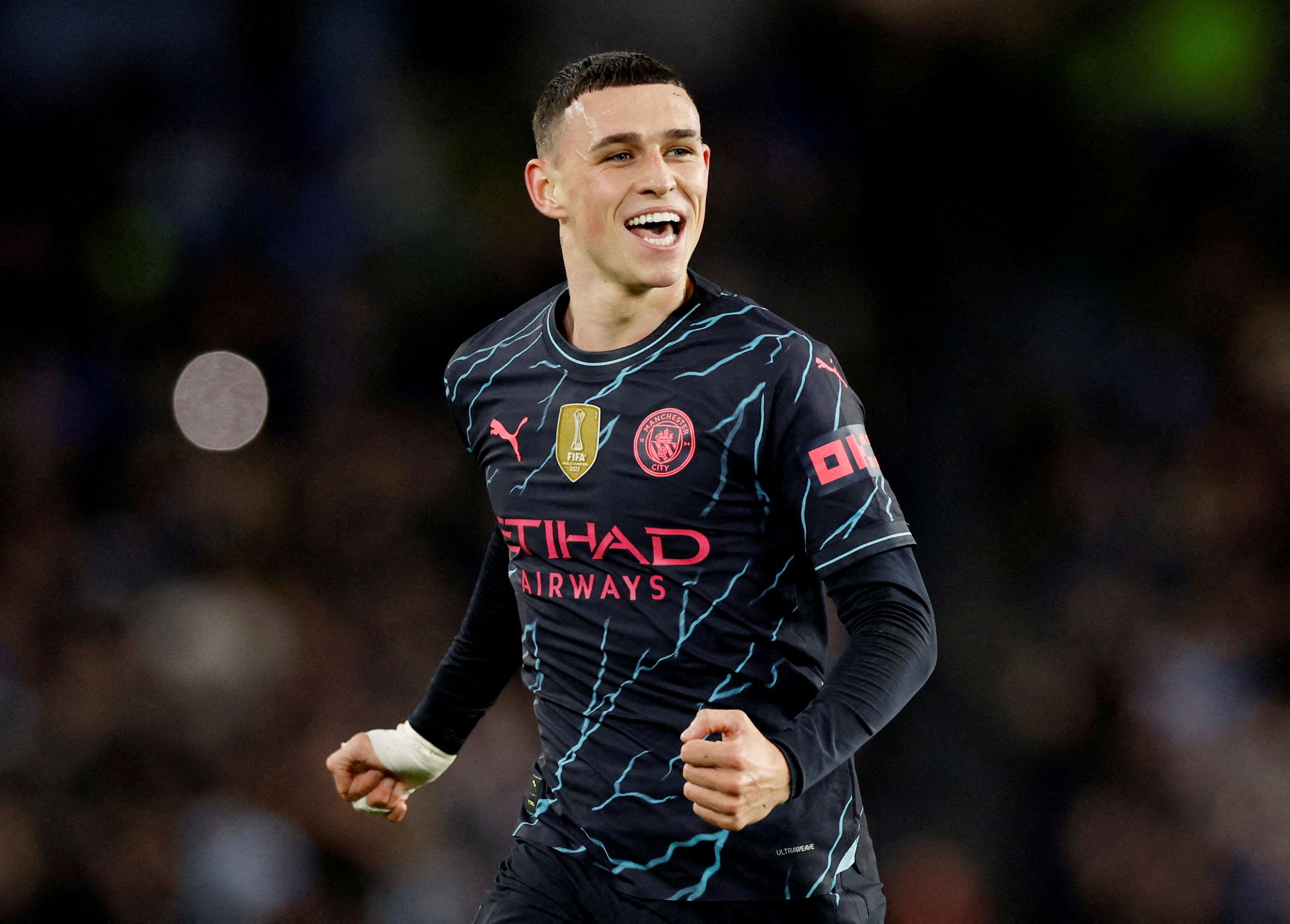 FILE PHOTO: Soccer Football - Premier League - Brighton & Hove Albion v Manchester City - The American Express Community Stadium, Brighton, Britain - April 25, 2024 Manchester City's Phil Foden celebrates scoring their second goal Action Images via Reuters/Peter Cziborra NO USE WITH UNAUTHORIZED AUDIO, VIDEO, DATA, FIXTURE LISTS, CLUB/LEAGUE LOGOS OR 'LIVE' SERVICES. ONLINE IN-MATCH USE LIMITED TO 45 IMAGES, NO VIDEO EMULATION. NO USE IN BETTING, GAMES OR SINGLE CLUB/LEAGUE/PLAYER PUBLICATIONS./File Photo