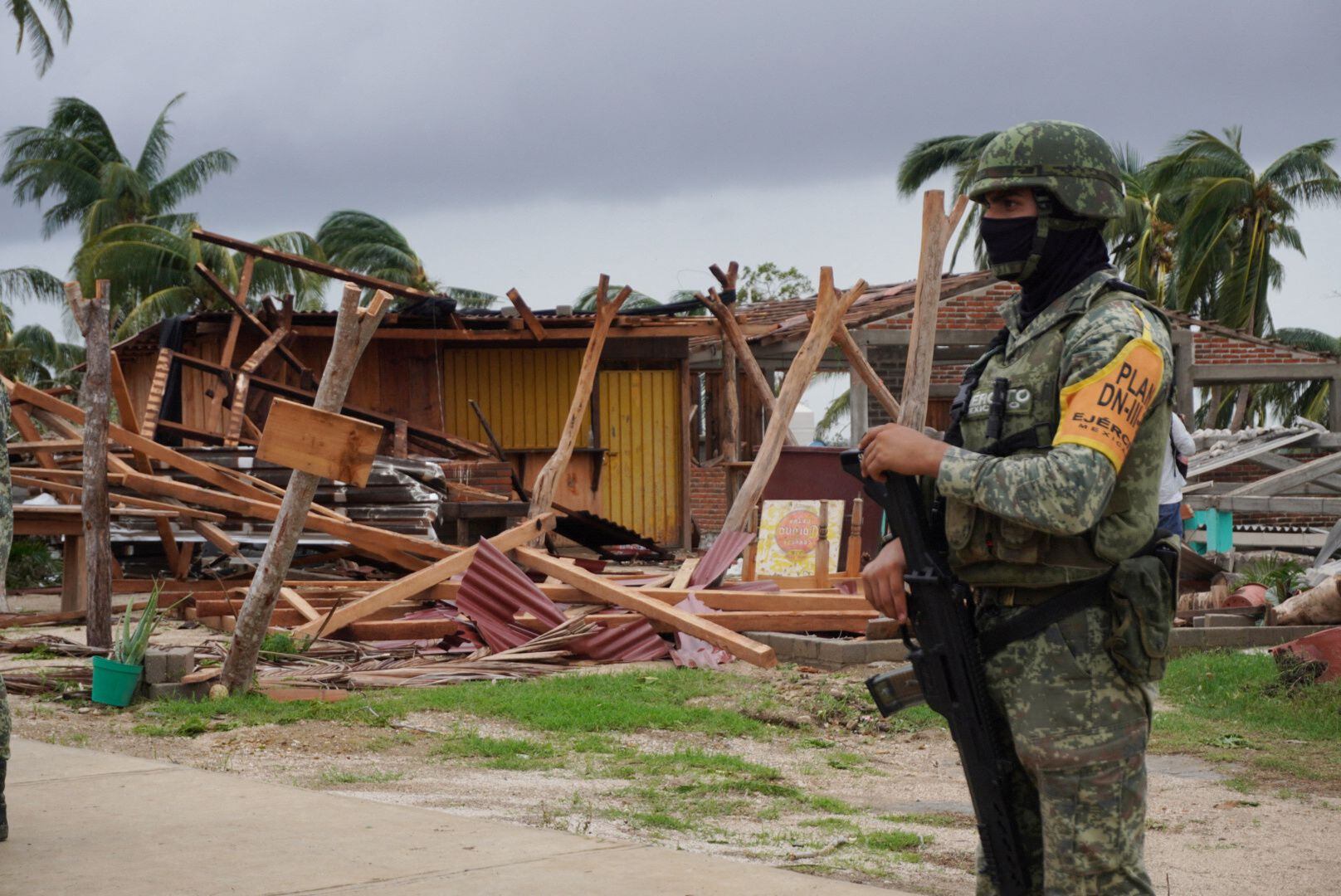 A soldier stands in an area damaged in the aftermath of Hurricane Agatha, in San Isidro del Palmar, Oaxaca state, Mexico, May 31, 2022. REUTERS/Jose de Jesus Cortes