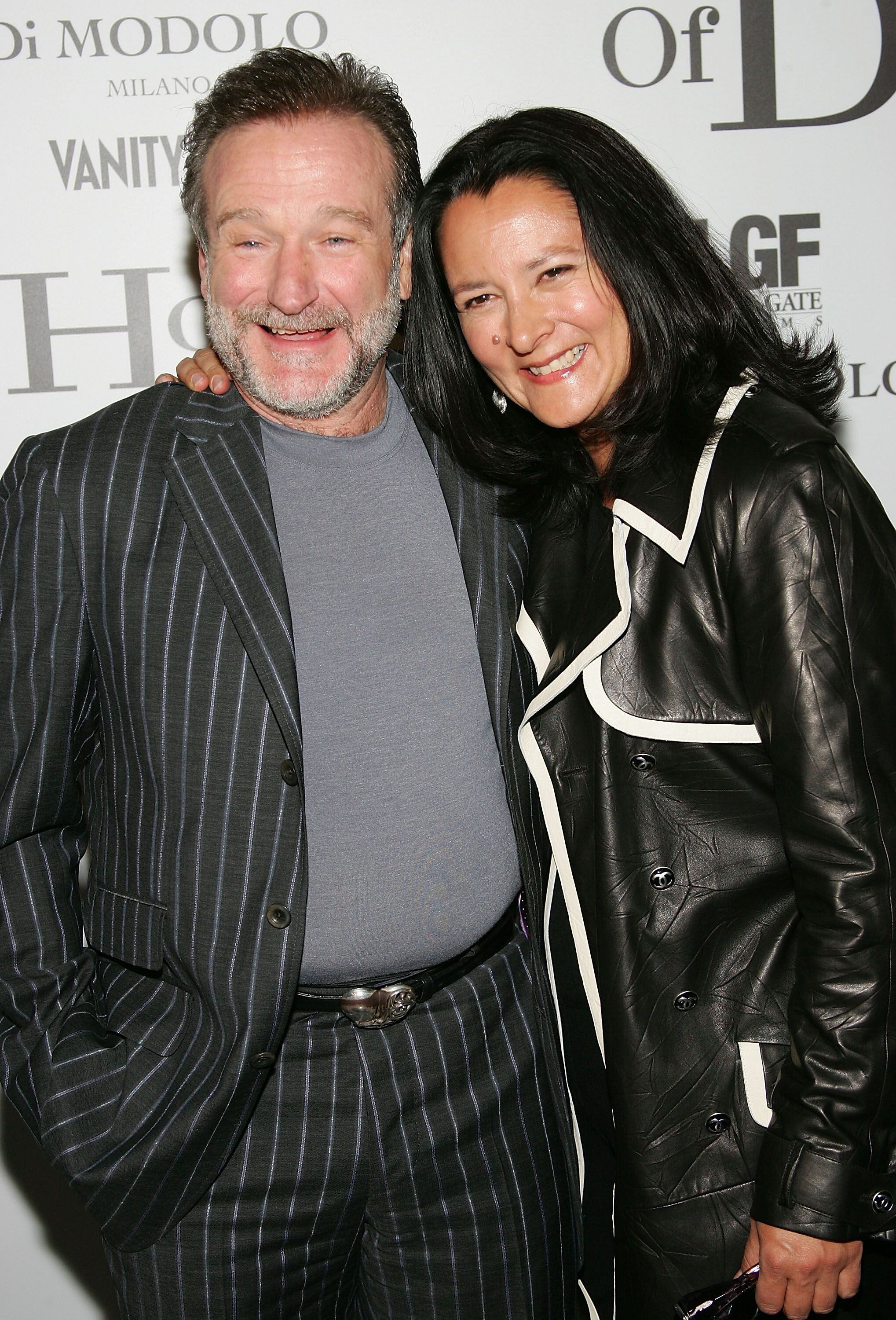 Robin Williams y su esposa Marsha Garces, la niñera de su hijo con Valerie. Se casaron cuando ella ya estaba embarazada. Tuvieron a Zelda Rae en 1989 y a Cody Alan, en 1991; se separaron en marzo de 2008 por "diferencias irreconciliables" (Evan Agostini/Getty Images)
