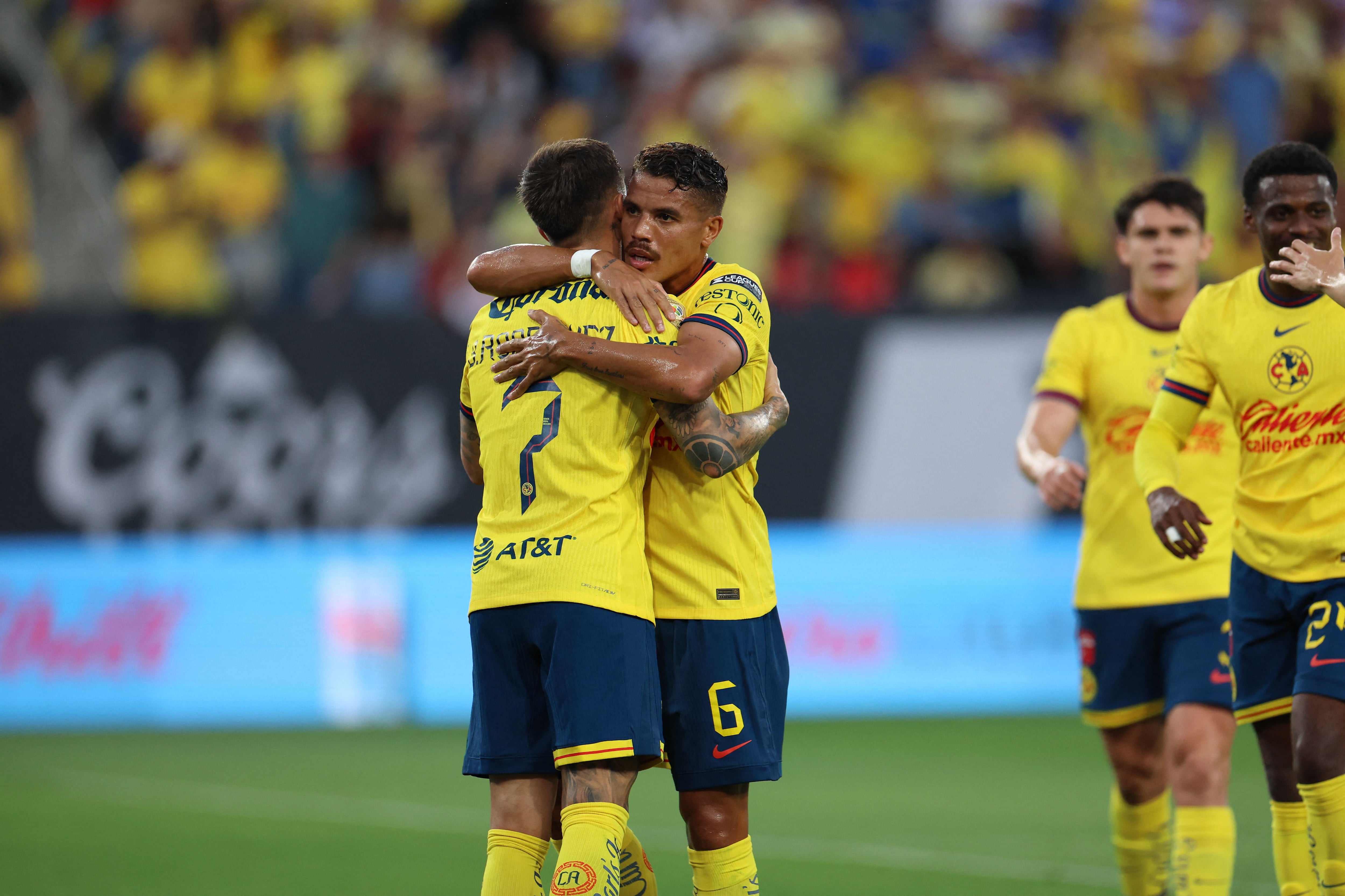 Aug 9, 2024; San Diego, California, USA; Club America midfielder Brian Rodriguez (7) and Club America midfielder Jonathan Dos Santos (6) celebrate a goal against Atlas FC at Snapdragon Stadium. Mandatory Credit: Abe Arredondo-USA TODAY Sports