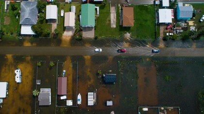 A depresión tropical de Imelda chegou con fortes choivas e inundou as rúas de Texas e Louisiana, nos Estados Unidos. (Foto: AP)