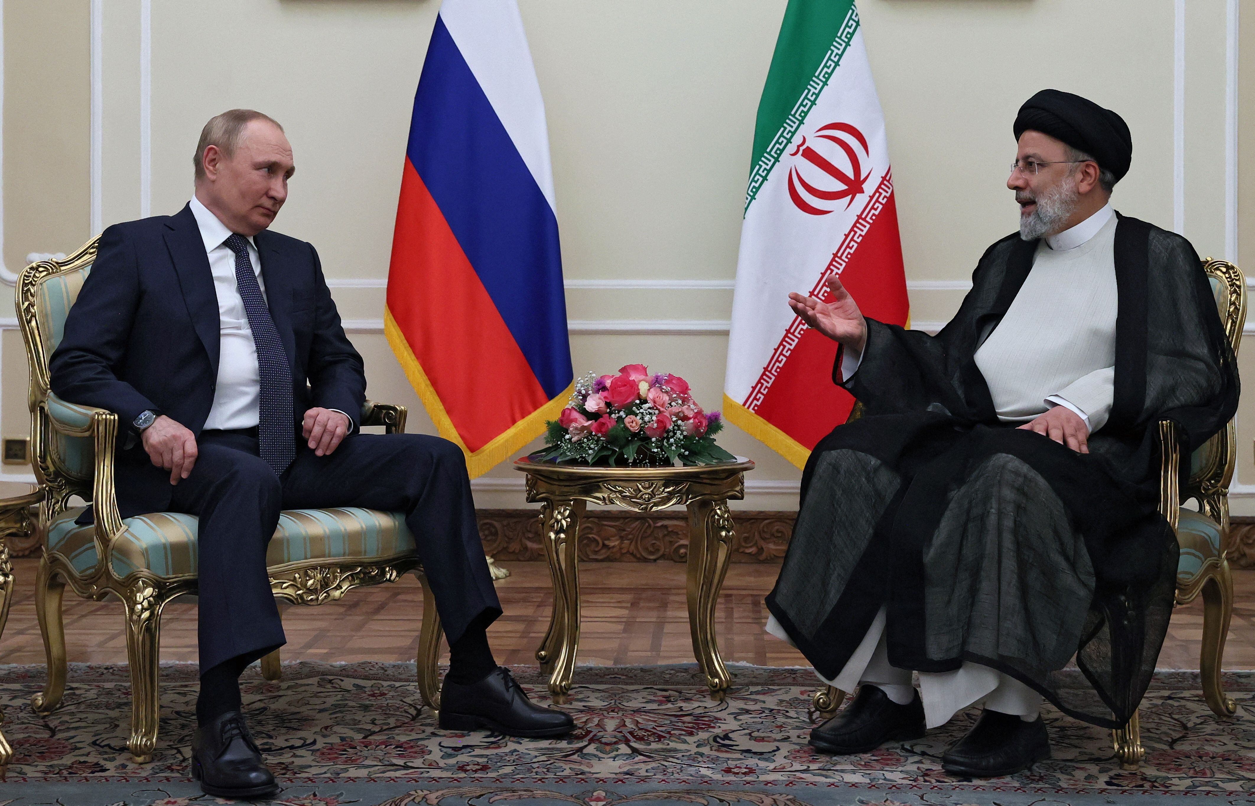 Russian President Vladimir Putin and Iranian President Ebrahim Raisi attend a meeting in Tehran, Iran July 19, 2022. Sputnik/Sergei Savostyanov/Pool via REUTERS ATTENTION EDITORS - THIS IMAGE WAS PROVIDED BY A THIRD PARTY.