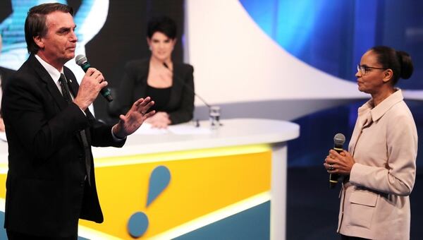 Bolsonaro y Silva durante el debate presidencial (Reuters)