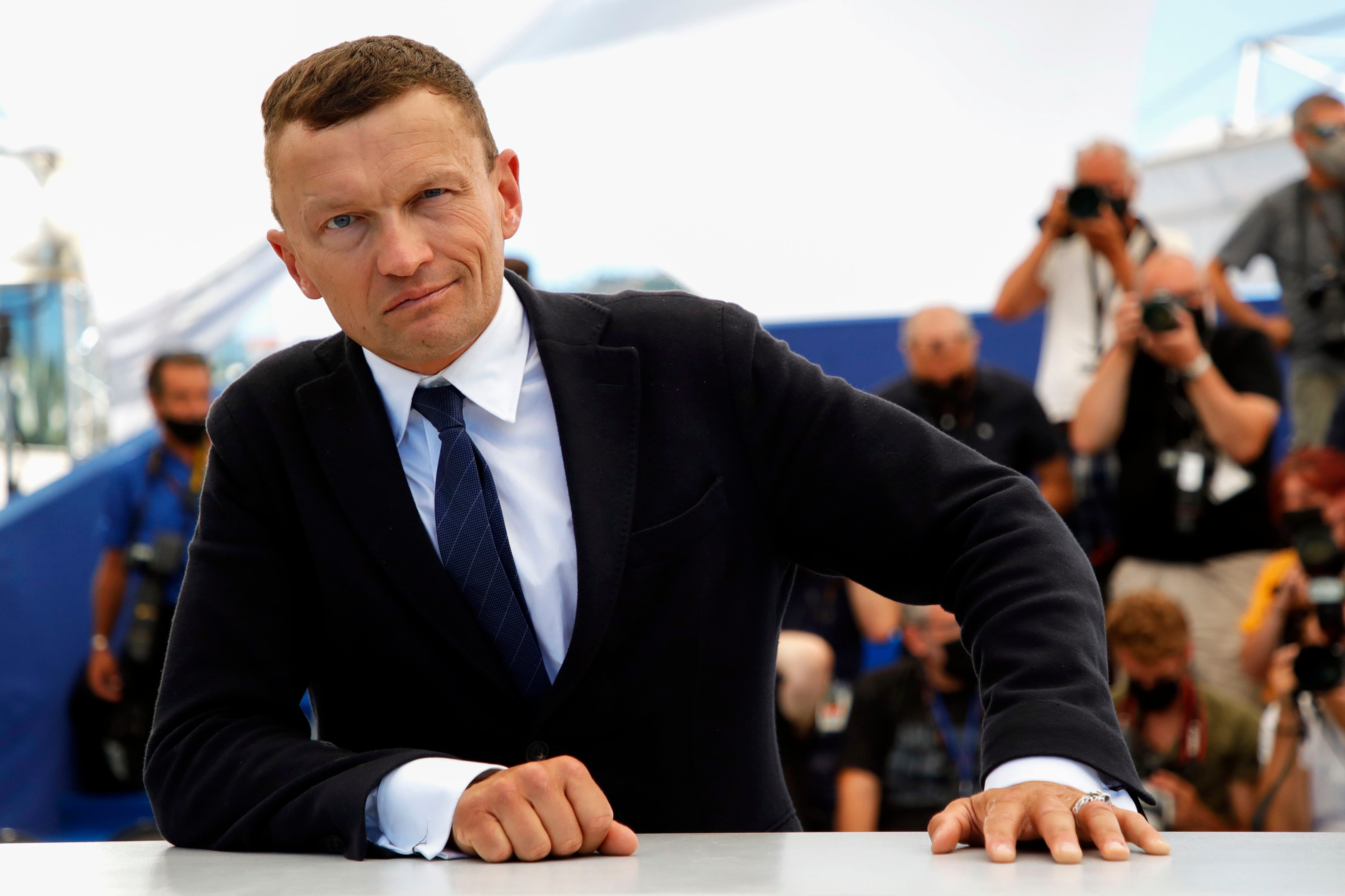 The 74th Cannes Film Festival - Photocall for the film "La panthere des neiges" (The Velvet Queen) presented as part of Cinema for the Climate - Cannes, France, July 14, 2021. Writer Sylvain Tesson poses. REUTERS/Sarah Meyssonnier