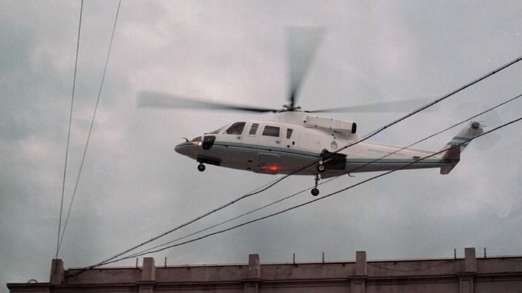 El ex presidente el día que abandonó la Casa Rosada en helicóptero (NA)
