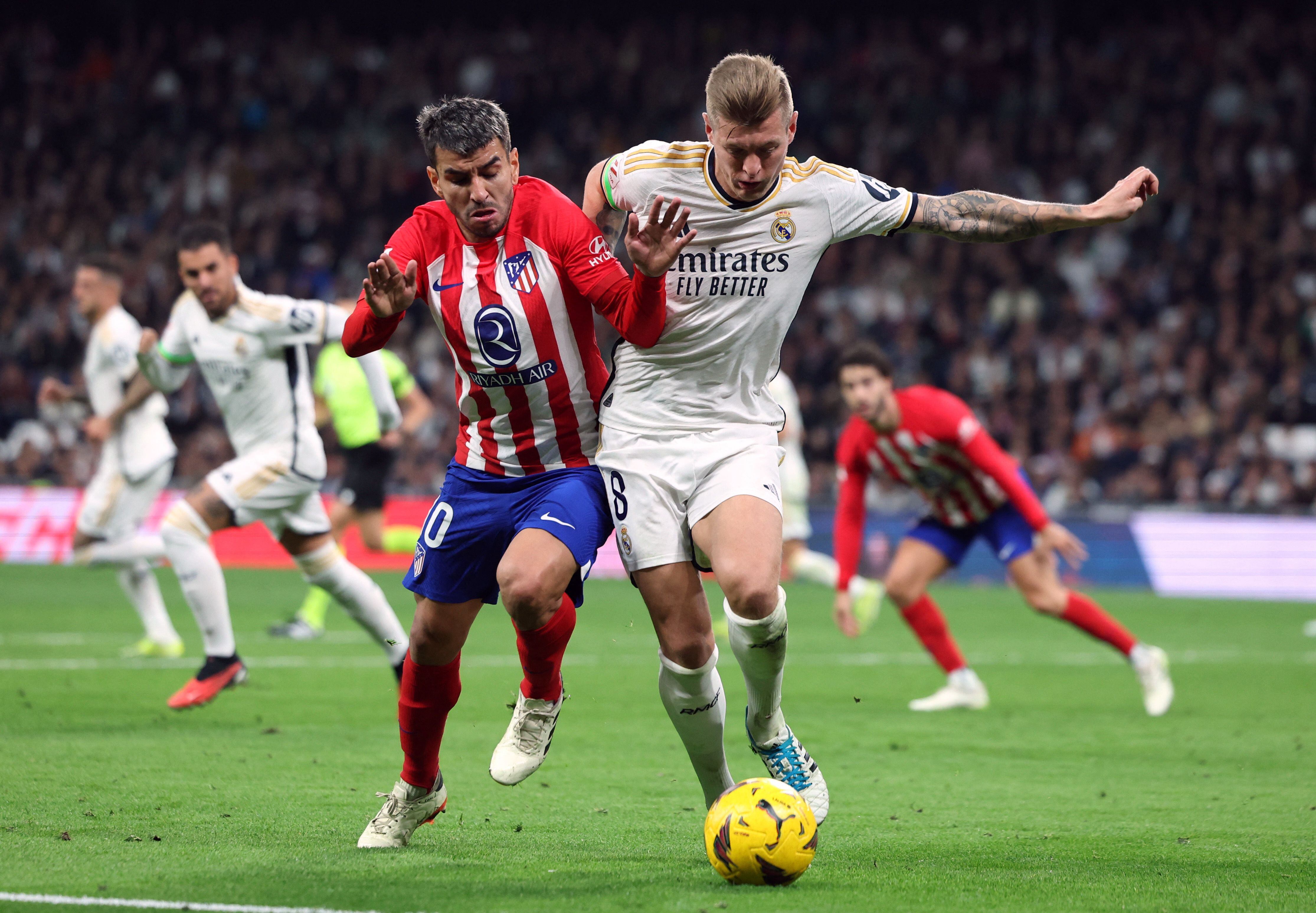 Dos modelos. Real Madrid y Atlético Madrid, dos clubes de primera de España. (foto Reuters) 