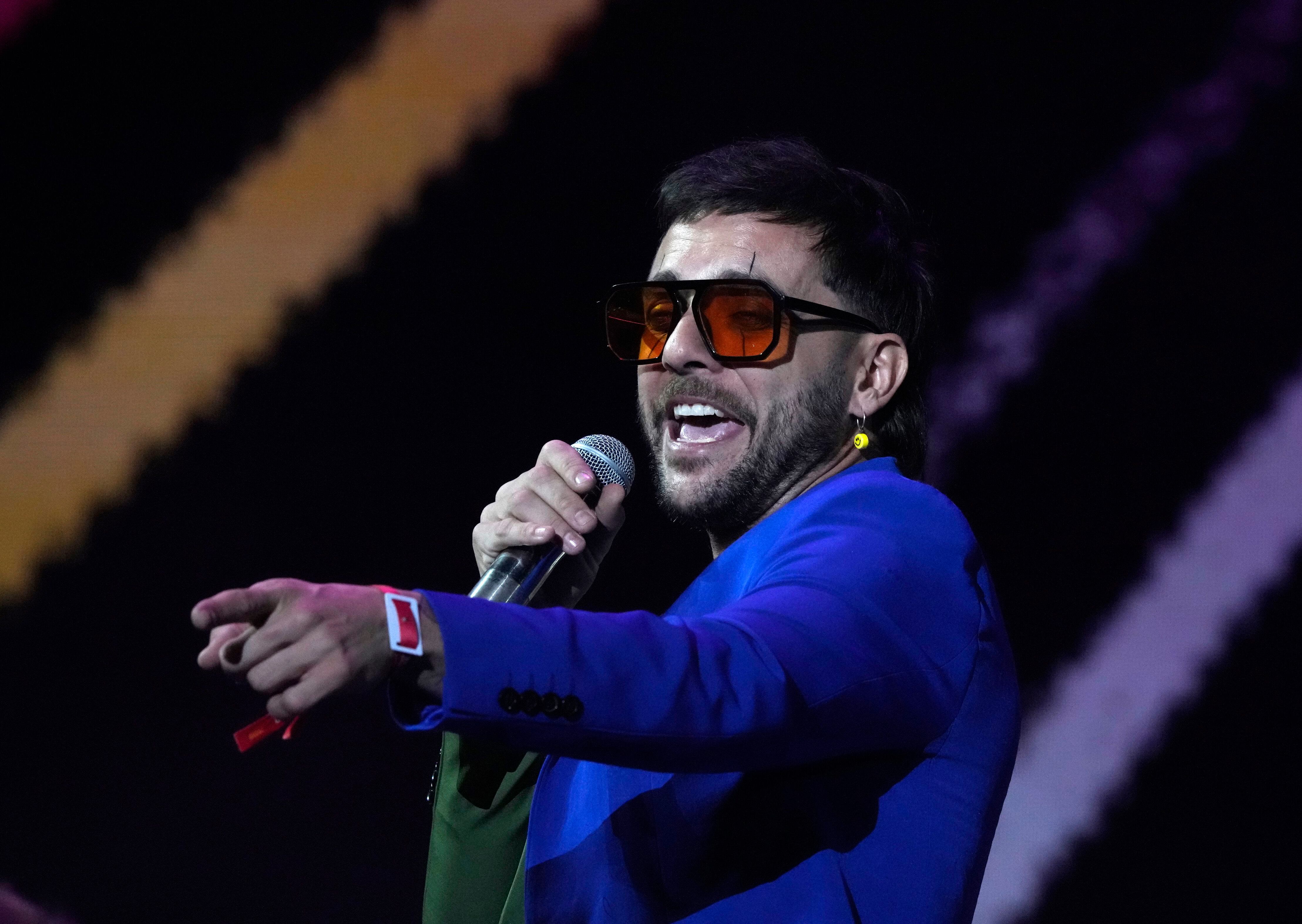 Los Caligaris durante su presentación en el festival Vive Latino en la Ciudad de México el sábado 18 de marzo de 2023. (Foto AP/Fernando Llano)