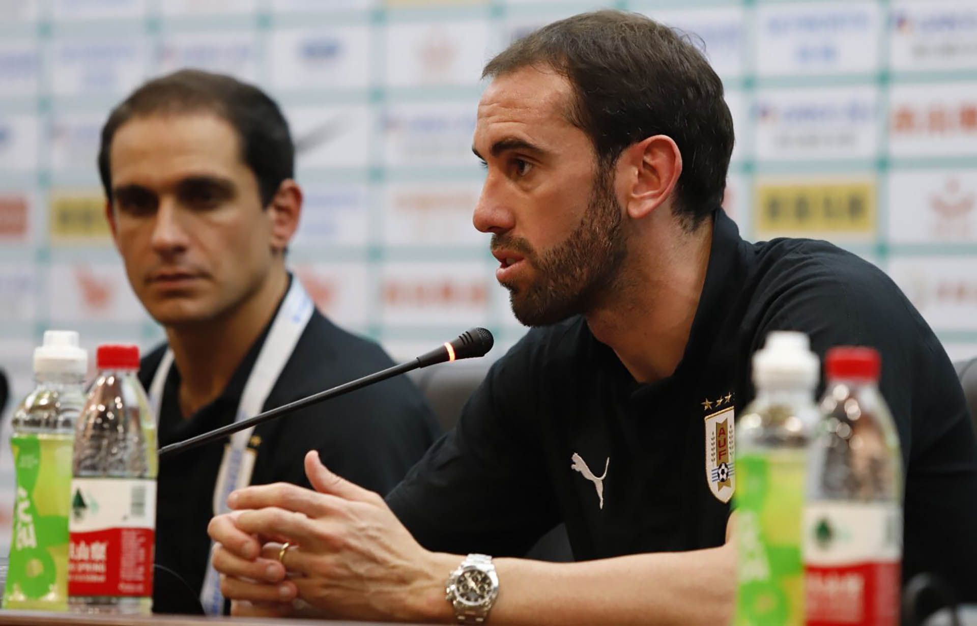 Matías Faral y Diego Godín