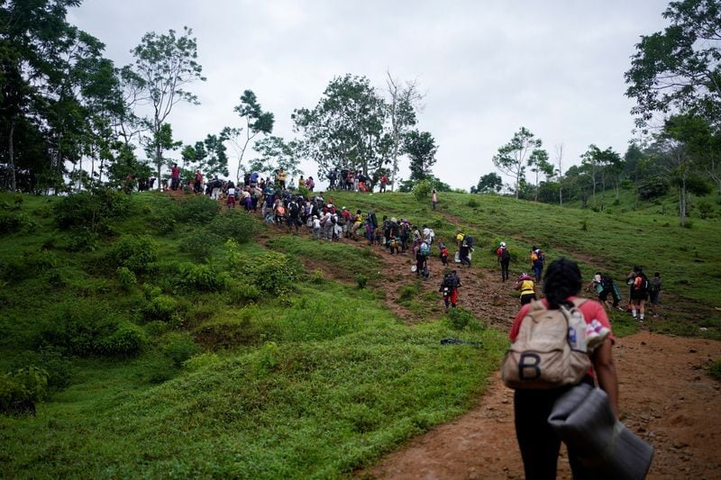 El cruce de migrantes se ha convertido en un negocio en el tapón del Darién - crédito Reuters 