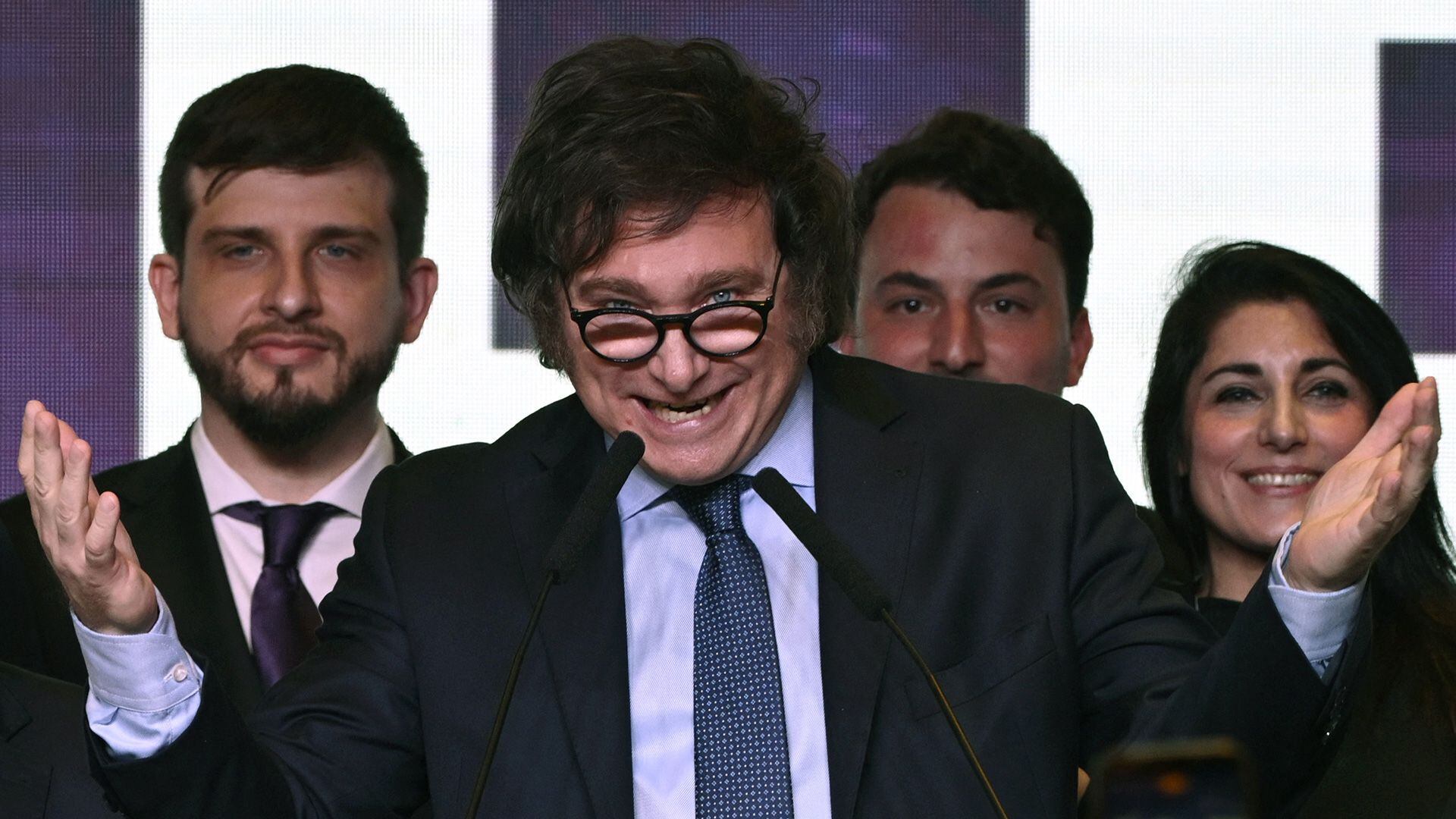 Argentine congressman and presidential candidate for La Libertad Avanza Alliance, Javier Milei, speaks to his supporters after learning the first results of the presidential elections at his party headquarters in Buenos Aires on October 22, 2023. Argentina's Economy Minister Sergio Massa and anti-establishment outsider Javier Milei will face off in a run-off presidential election, according to partial poll results released. (Photo by LUIS ROBAYO / AFP)