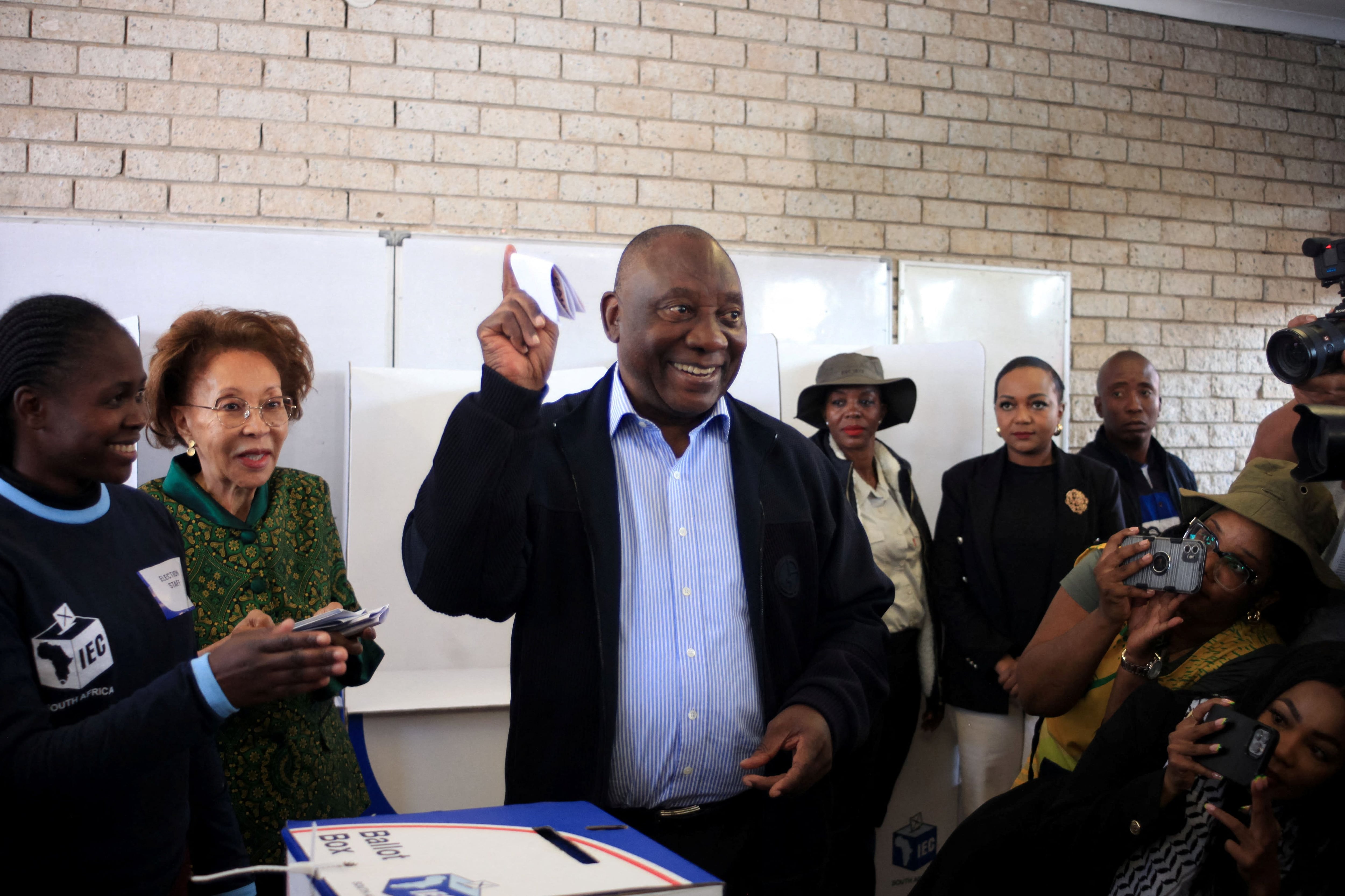 South African president Cyril Ramaphosa casts his vote during the South African elections in Soweto, South Africa May 29, 2024 REUTERS/Oupa Nkosi