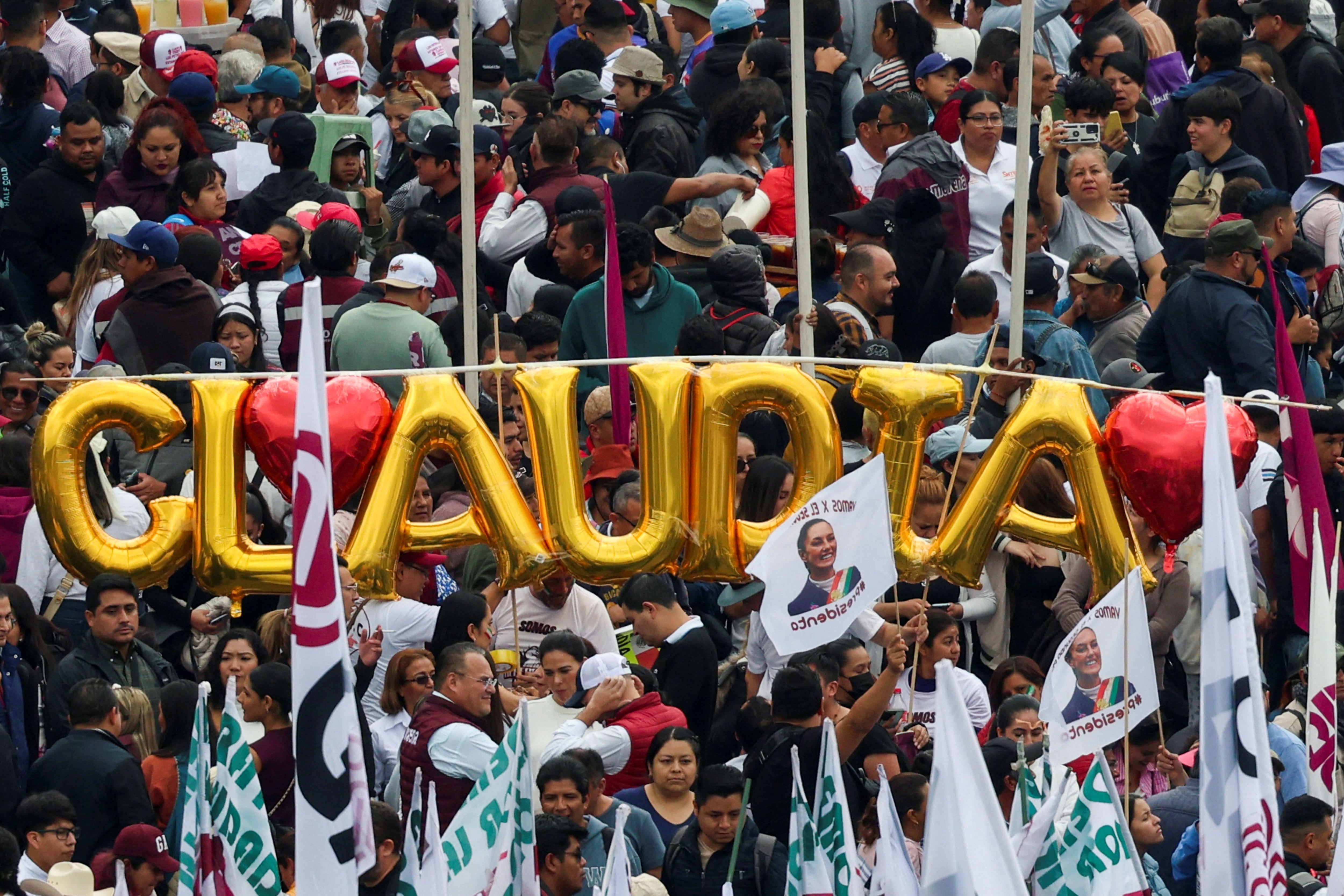 Supporters of Mexico's new President Claudia Sheinbaum attend her inauguration celebration event at Zocalo Square, in Mexico City, Mexico October 1, 2024. REUTERS/Luis Cortes