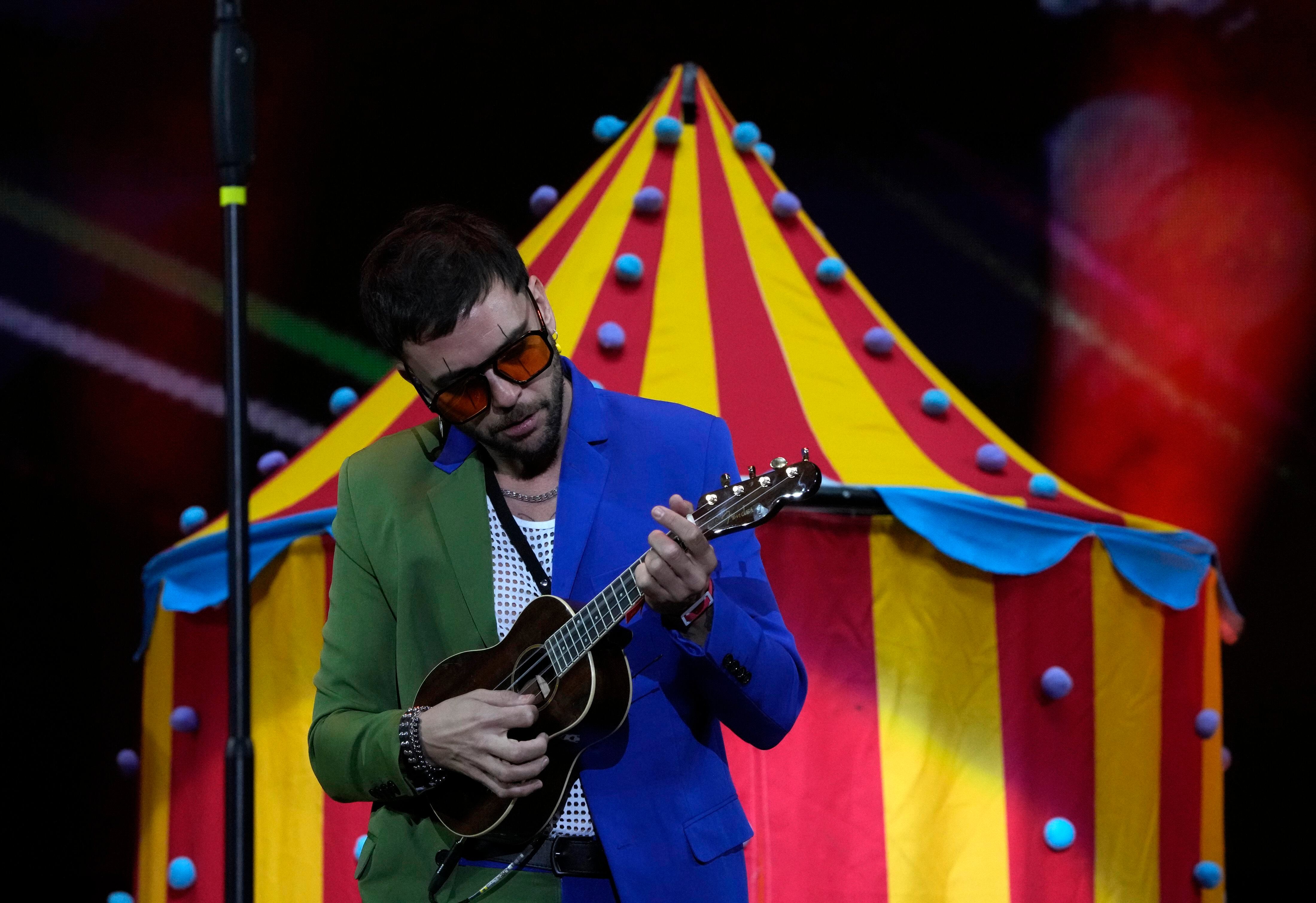 Los Caligaris durante su presentación en el festival Vive Latino en la Ciudad de México el sábado 18 de marzo de 2023. (Foto AP/Fernando Llano)