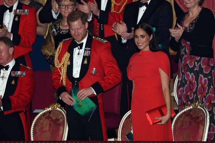 Britain's Prince Harry and his wife Meghan attend the Mountbatten Festival of Music at the Royal Albert Hall in London, Britain March 7, 2020. Eddie Mulholland/Pool via REUTERS
