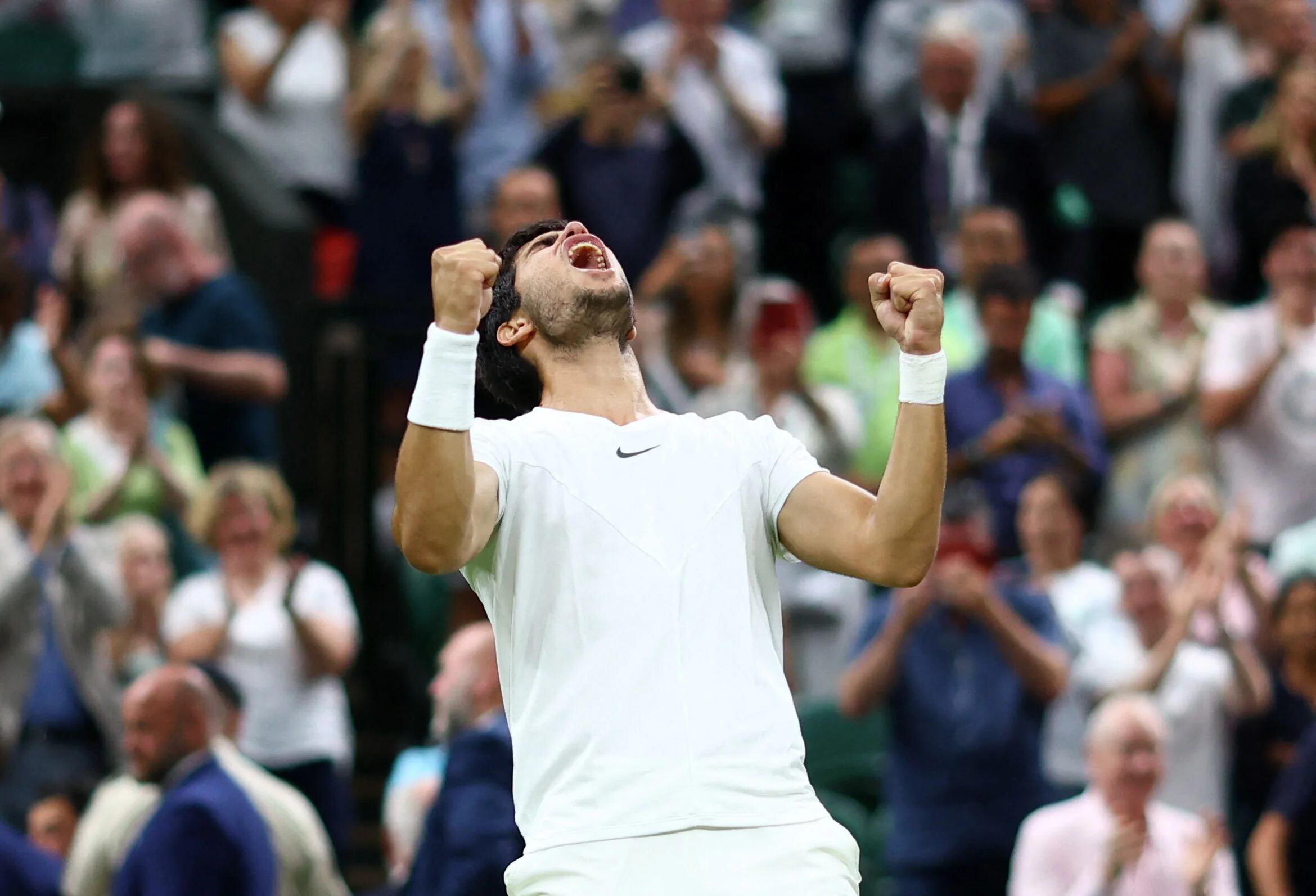 Tennis - Wimbledon - All England Lawn Tennis and Croquet Club, London, Britain - July 10, 2023 Spain's Carlos Alcaraz celebrates winning his fourth round match against Italy's Matteo Berrettini REUTERS/Hannah Mckay