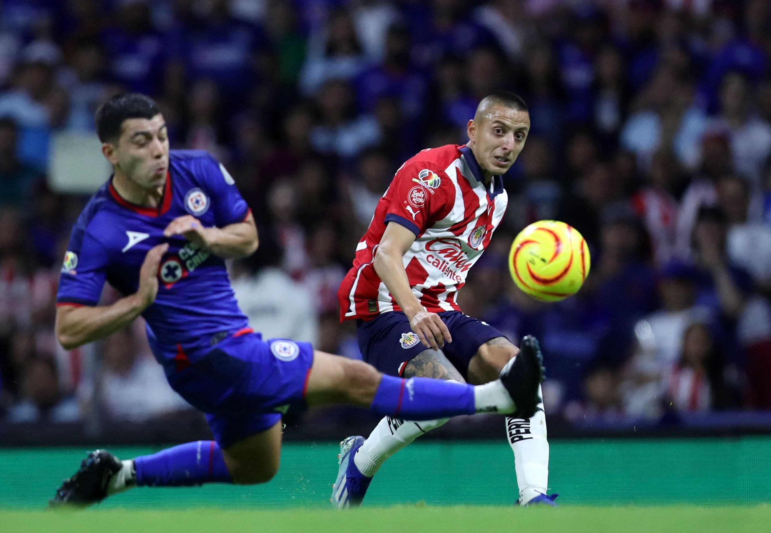 Soccer Football - Mexico - Liga MX - Cruz Azul v Guadalajara - Estadio Ciudad de los Deportes, Mexico City, Mexico - March 2, 2024 Cruz Azul's Erik Lira in action with Guadalajara's Roberto Alvarado REUTERS/Raquel Cunha