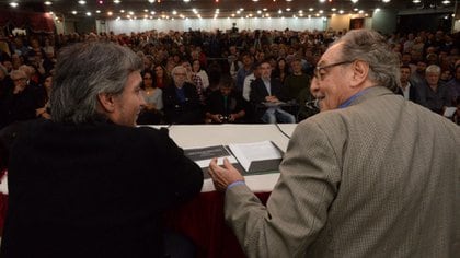 Máximo Kirchner y Carlos Heller, factótum político y autor intelectual de la iniciativa