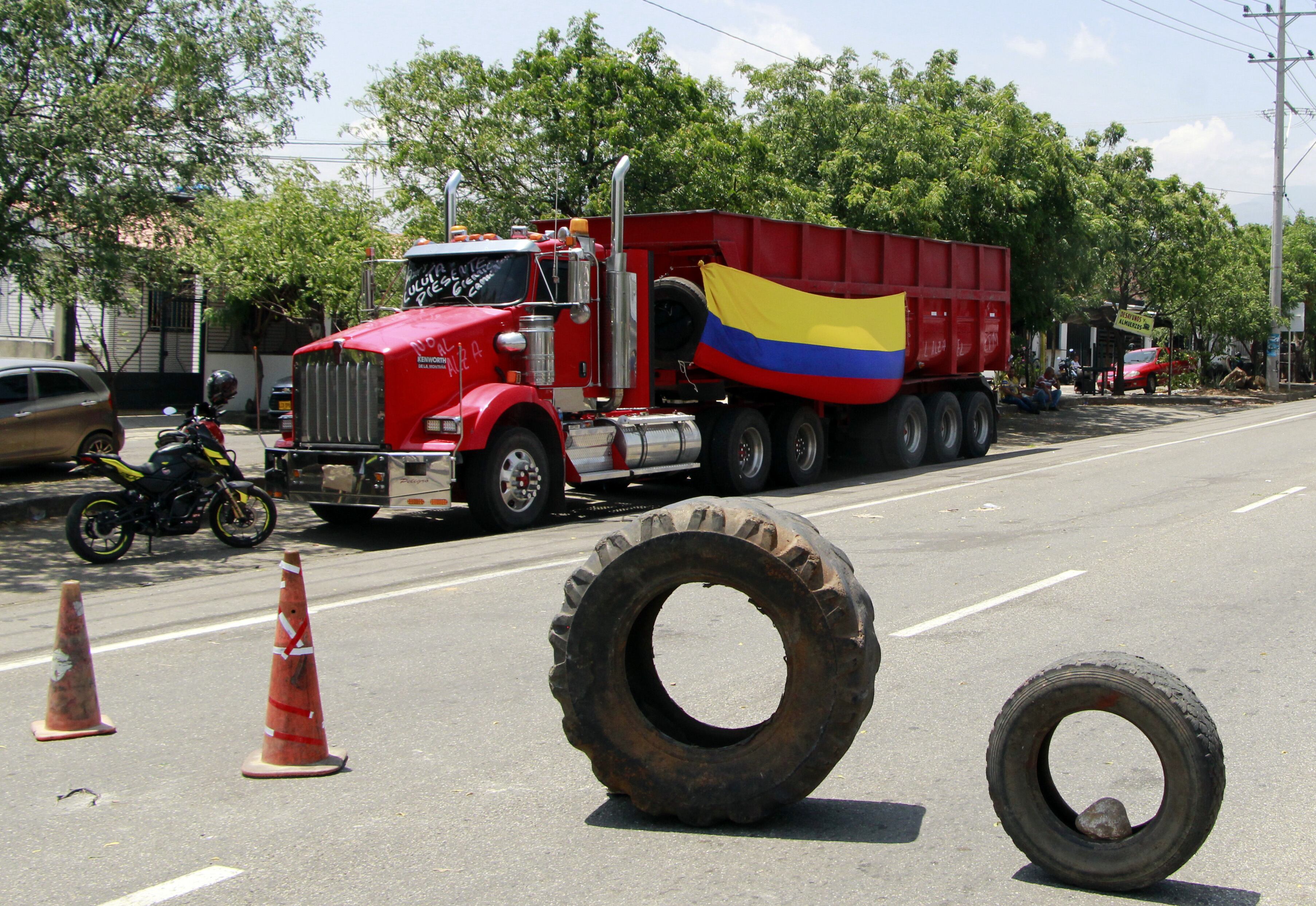 El paro de camioneros también ha afectado la comercialización de alimentos en el país - crédito Mario Caicedo/EFE
