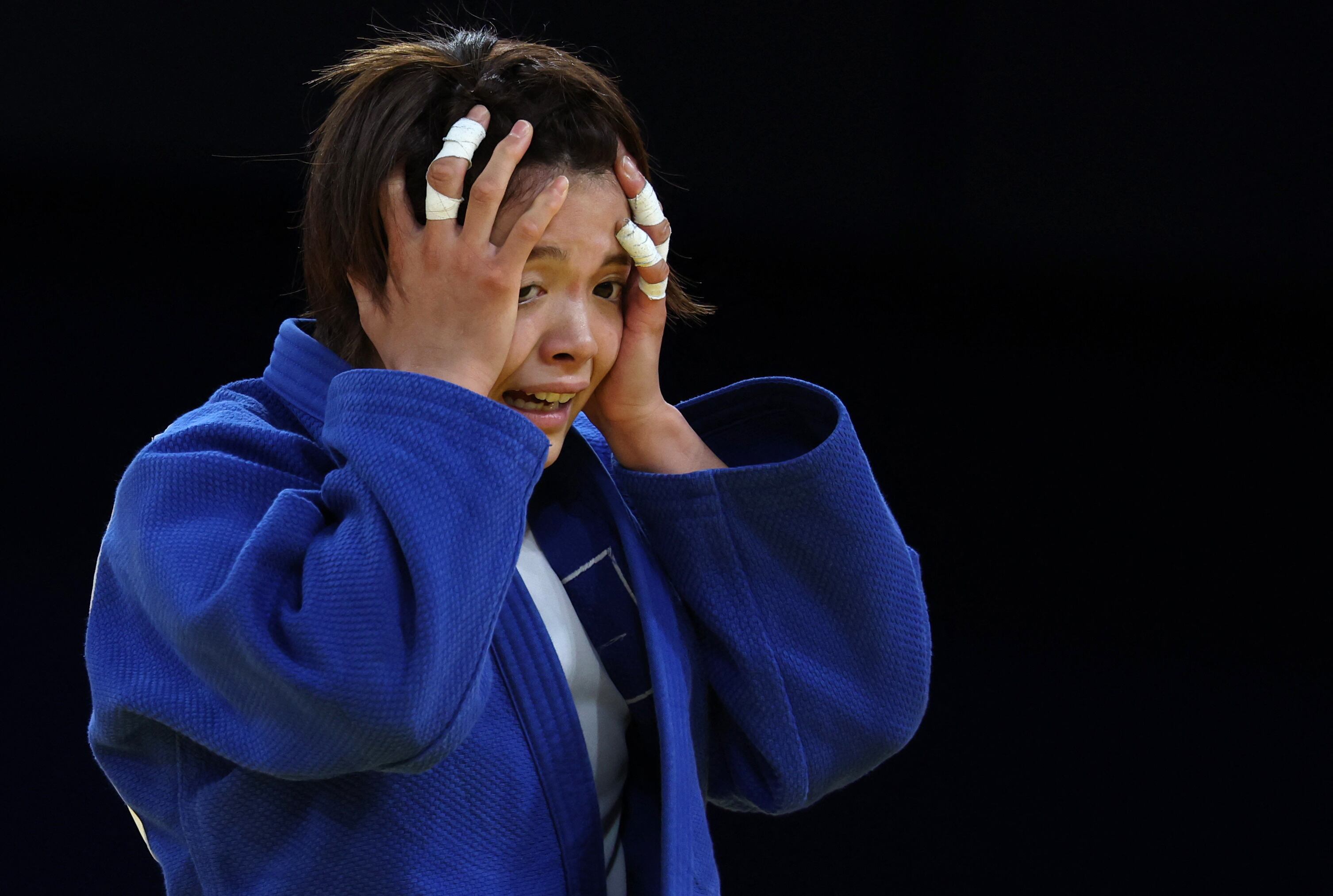 La primera reacción de la japonesa tras la capida (REUTERS/Kim Kyung-Hoon)