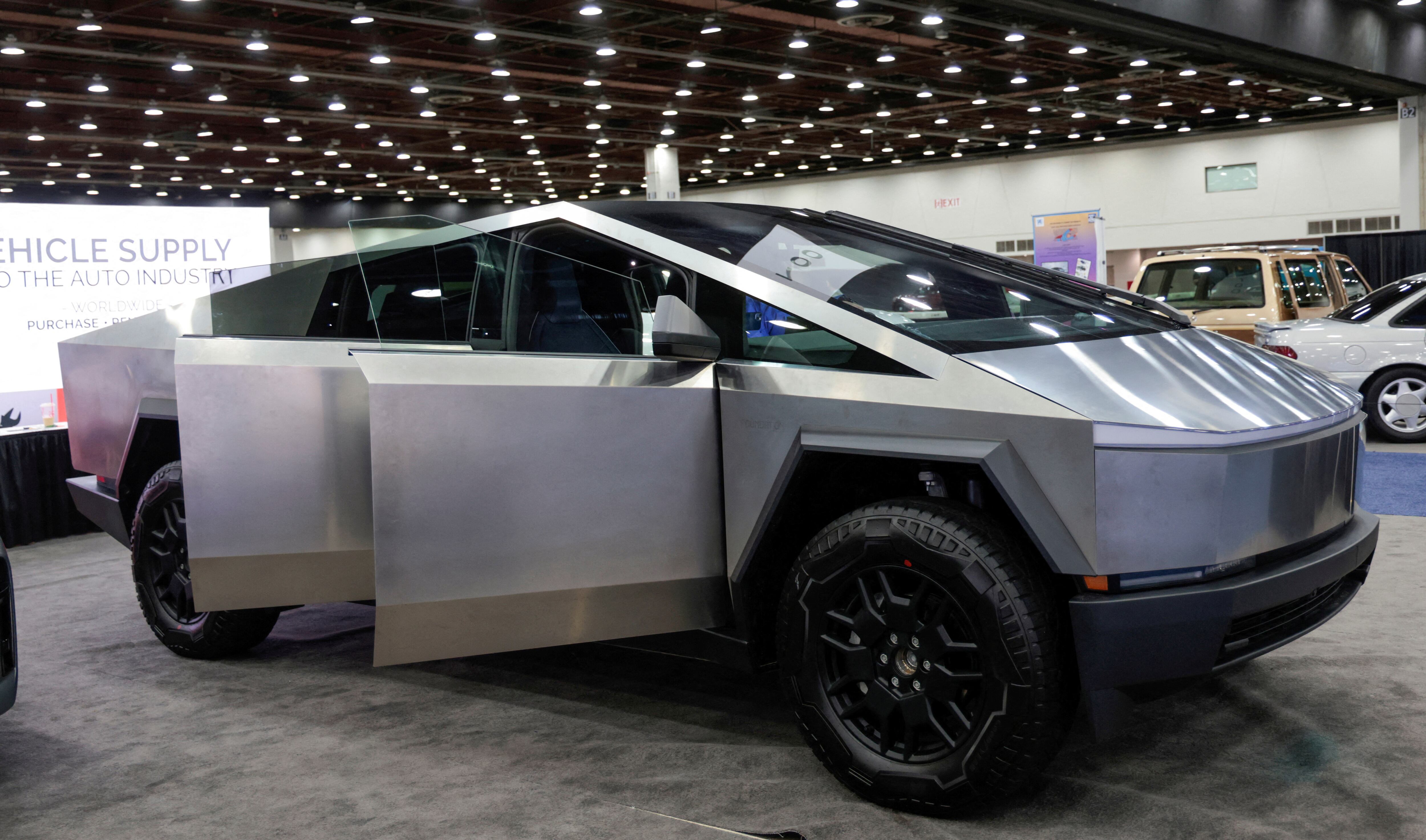 FILE PHOTO: The Tesla Cybertruck is displayed at the SAE WCX conference in Detroit, Michigan, U.S., April 18, 2024. REUTERS/Rebecca Cook/File Photo