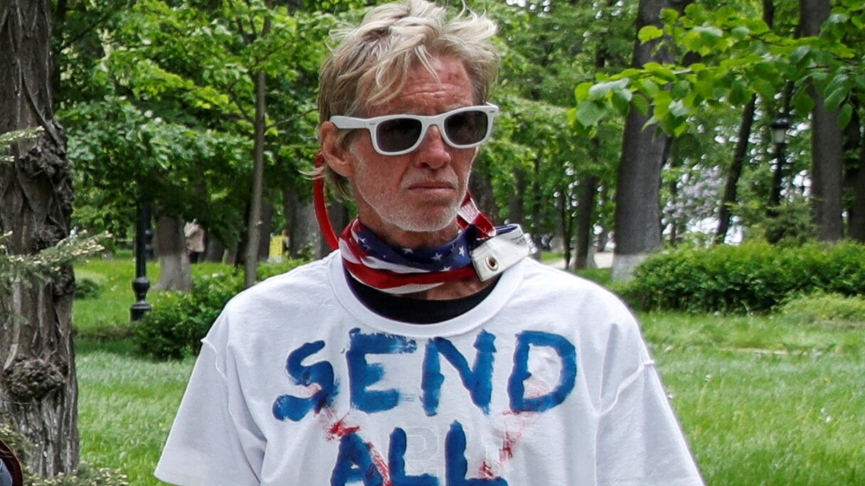 Ryan W. Routh, a suspect identified by news organizations, as the FBI investigates what they said was an apparent assassination attempt in Florida on Republican presidential nominee and former U.S. President Donald Trump, is seen during a rally demanding China's leader's assistance to organise an extraction process for Ukrainian service members from Azovstal Iron and Steel Works in Mariupol, in Kyiv, Ukraine May 17, 2022. REUTERS/Valentyn Ogirenko     TPX IMAGES OF THE DAY