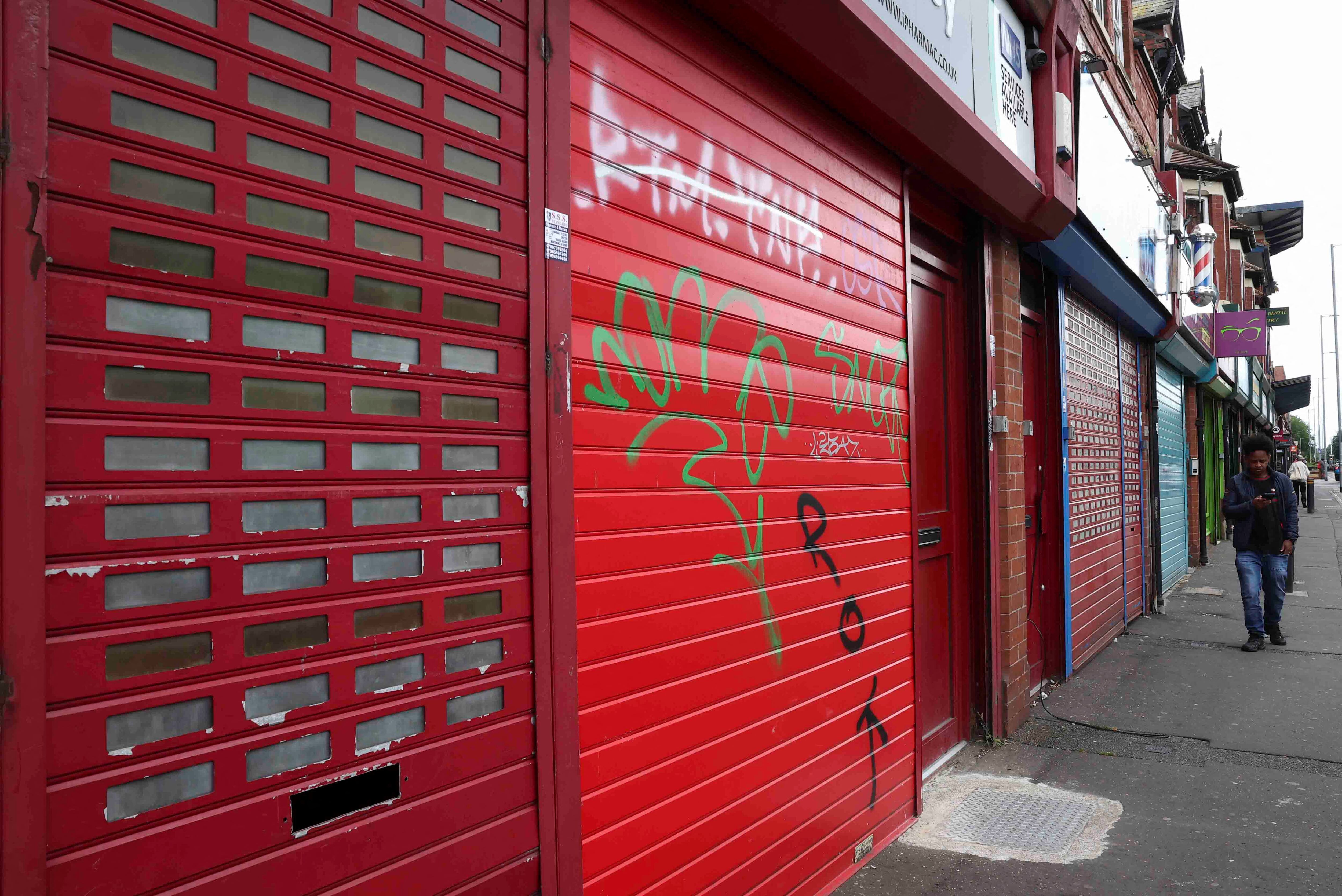 A view of closed businesses in the midst of unrest due to anti-immigration related rioting across the country, in Manchester, Britain, August 7, 2024. REUTERS/Yves Herman