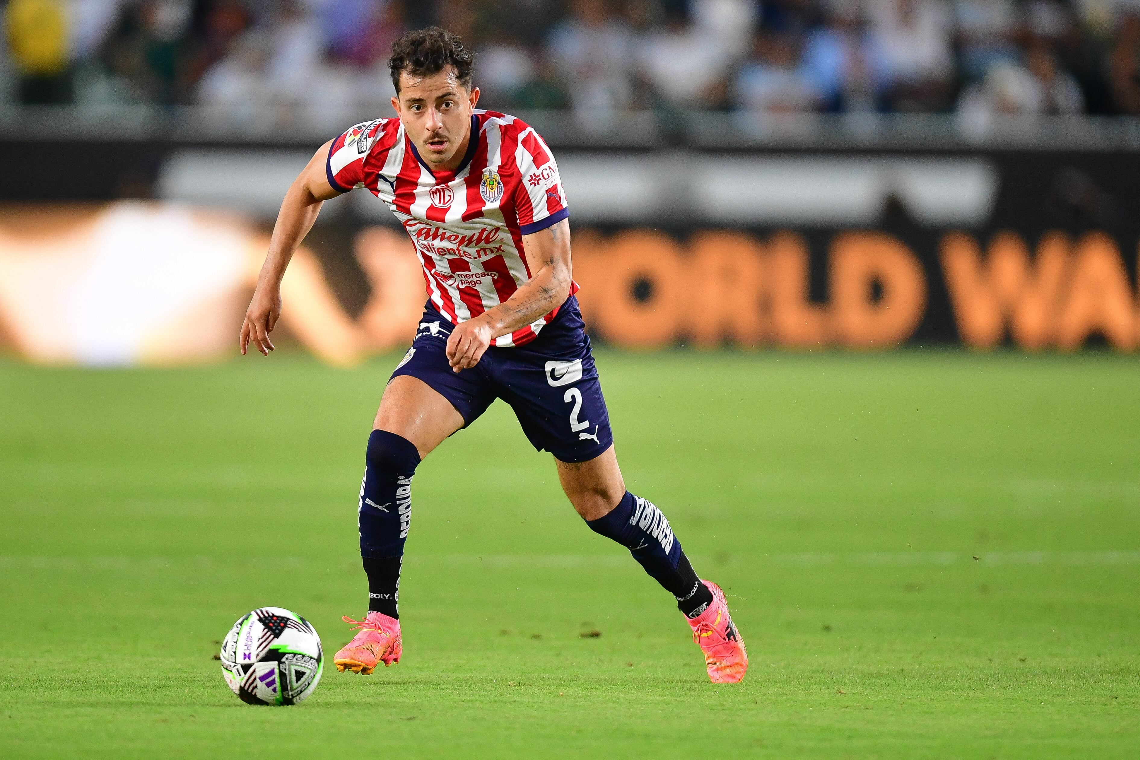 August 4, 2024; Carson, California, USA; Chivas defender Alan Mozo (2) moves in for a shot on goal against LA Galaxy during the first half at Dignity Health Sports Park. Mandatory Credit: Gary A. Vasquez-USA TODAY Sports