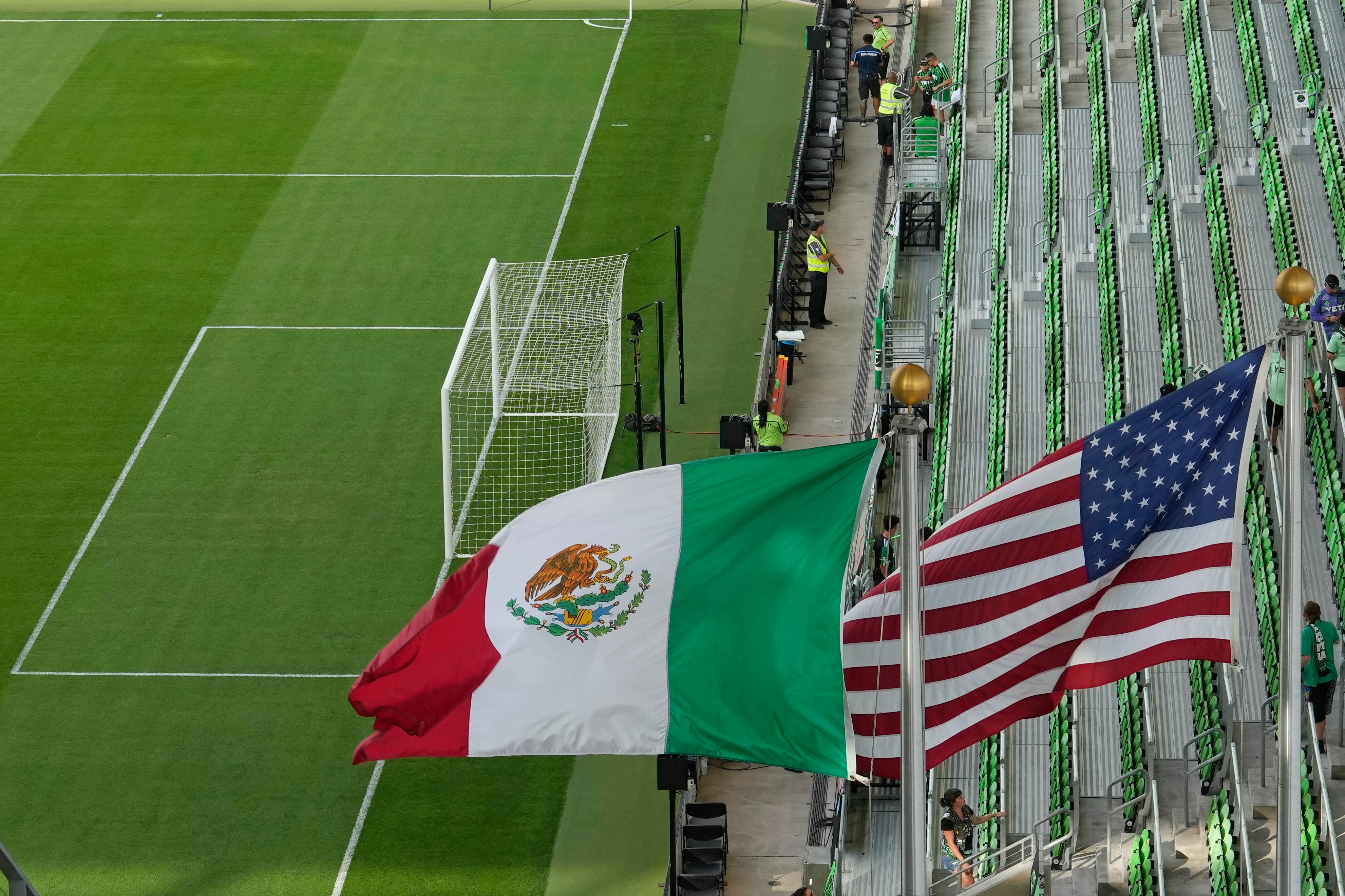 Jul 26, 2024; Austin, Texas, USA; United States and Mexico flags before the match between Austin FC and Pumas CU at Q2 Stadium. Mandatory Credit: Scott Wachter-USA TODAY Sports