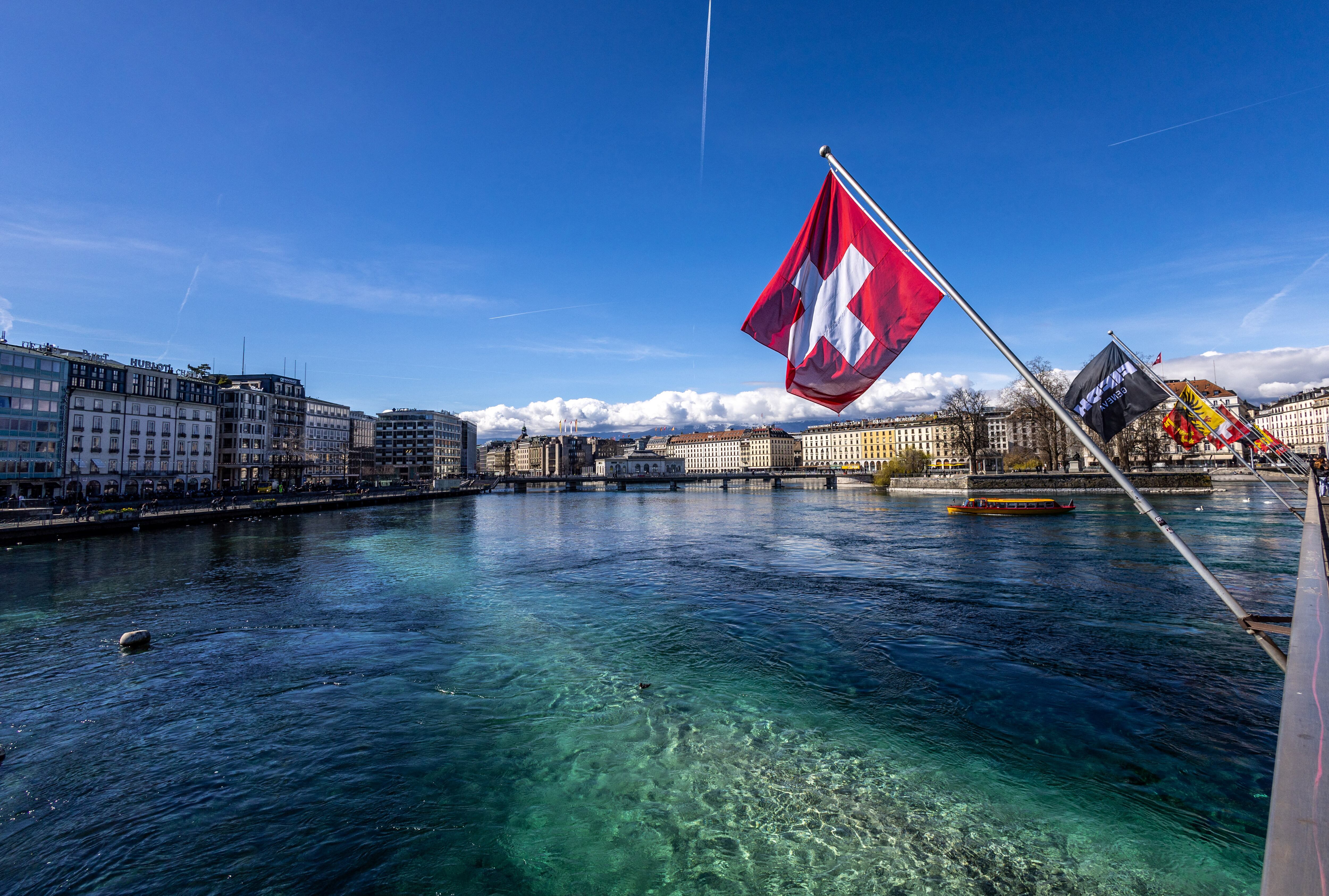 Swiss flag is pictured at the Harbour in Geneva, Switzerland, March 13, 2024. REUTERS/Denis Balibouse