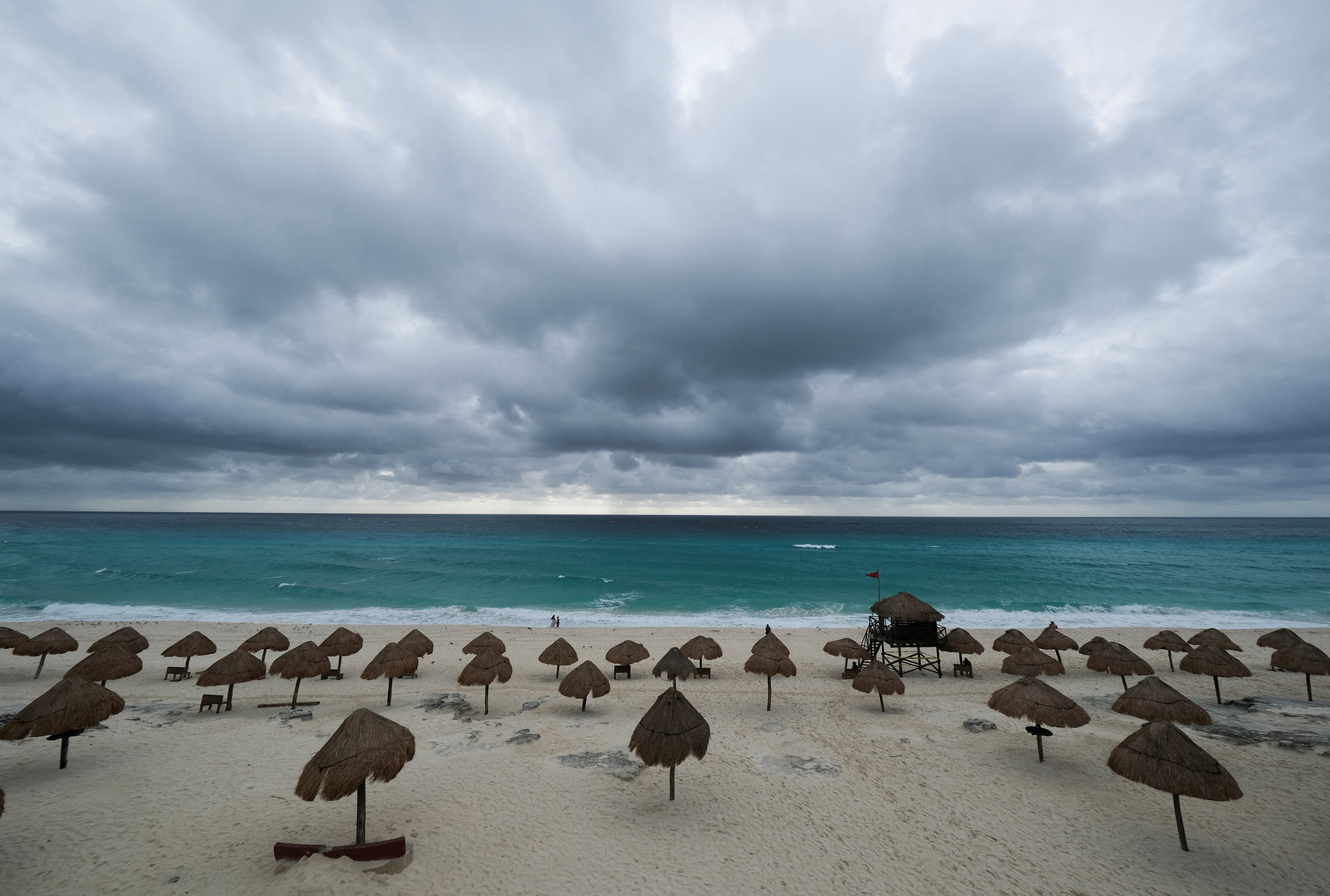 A view of an empty beach as Hurricane Milton advances past Mexico's Yucatan Peninsula on its way to Florida, in Cancun, Mexico October 8, 2024. REUTERS/Paola Chiomante