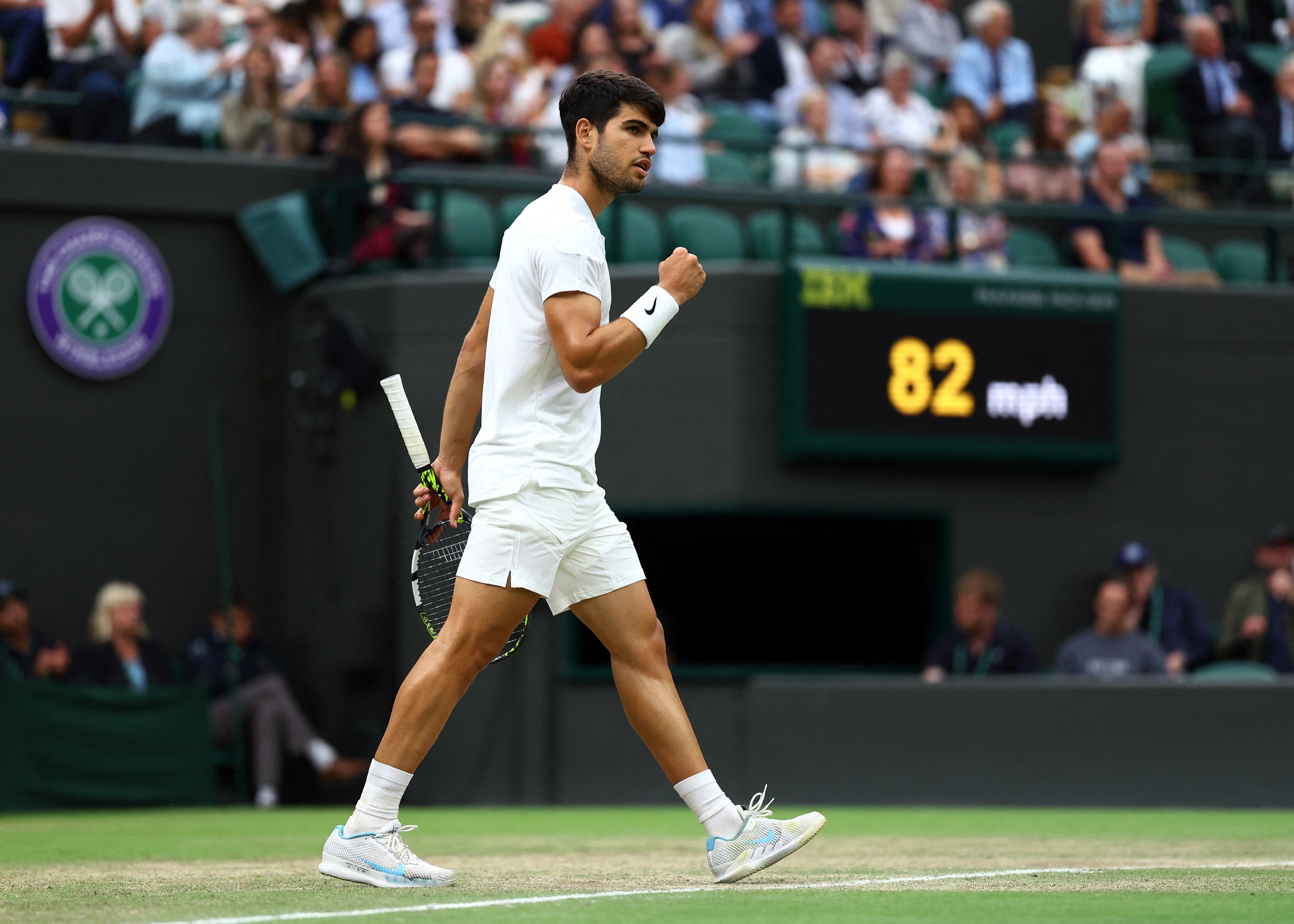 Tennis - Wimbledon - All England Lawn Tennis and Croquet Club, London, Britain - July 9, 2024 Spain's Carlos Alcaraz reacts during his quarter final match against Tommy Paul of the U.S. REUTERS/Hannah Mckay