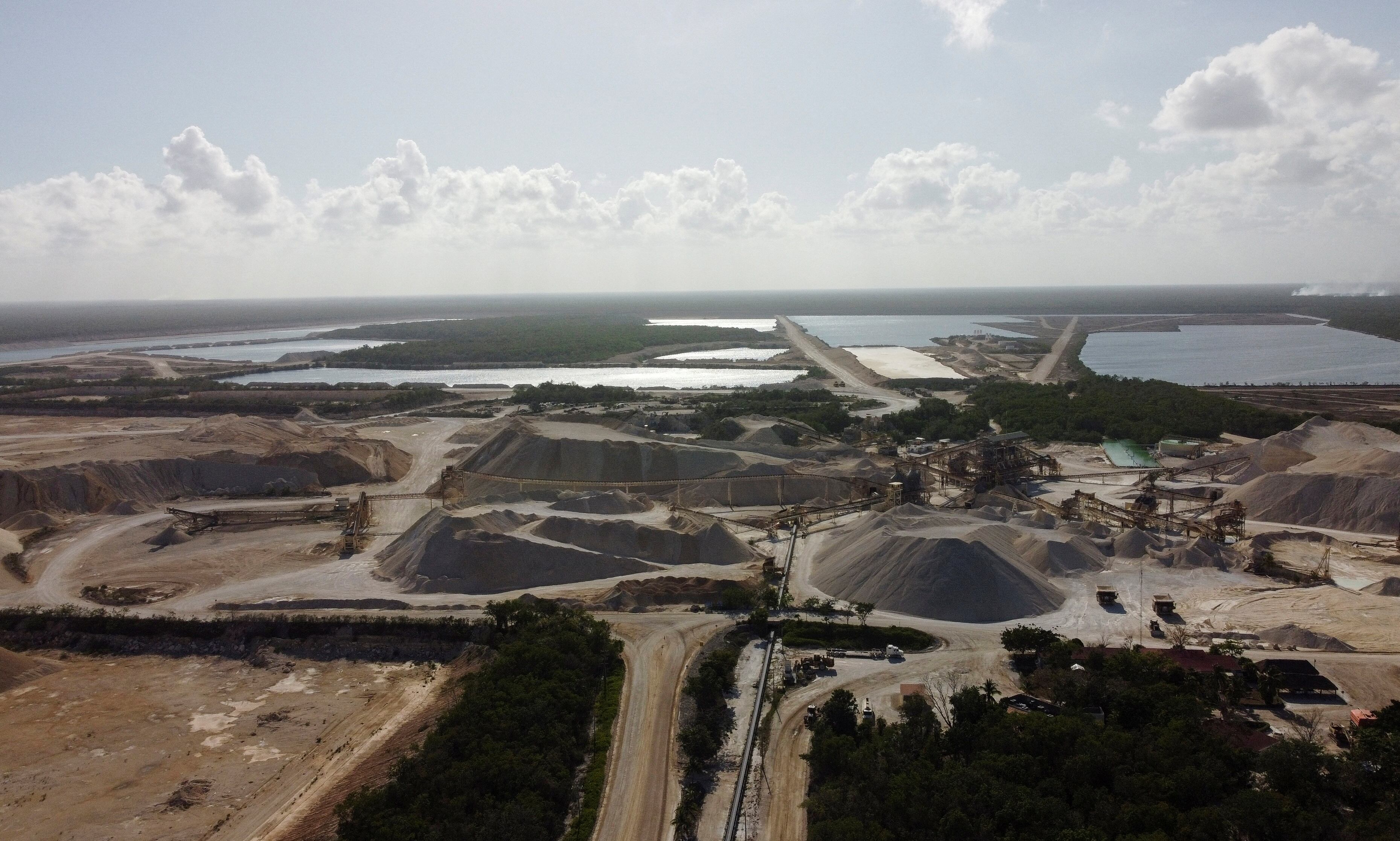 A general view shows part of the limestone mining by Vulcan Materials in Calica, in Quintana Roo state, Mexico May 6, 2022. Mexico's government on Friday ordered a halt to Vulcan Materials, a producer of gravel and crushed stone, citing environmental concerns and provoking the U.S.-based firm to say it will take legal action to restart operations in Playa del Carmen. Picture taken with a drone May 6, 2022. REUTERS/Paola Chiomante