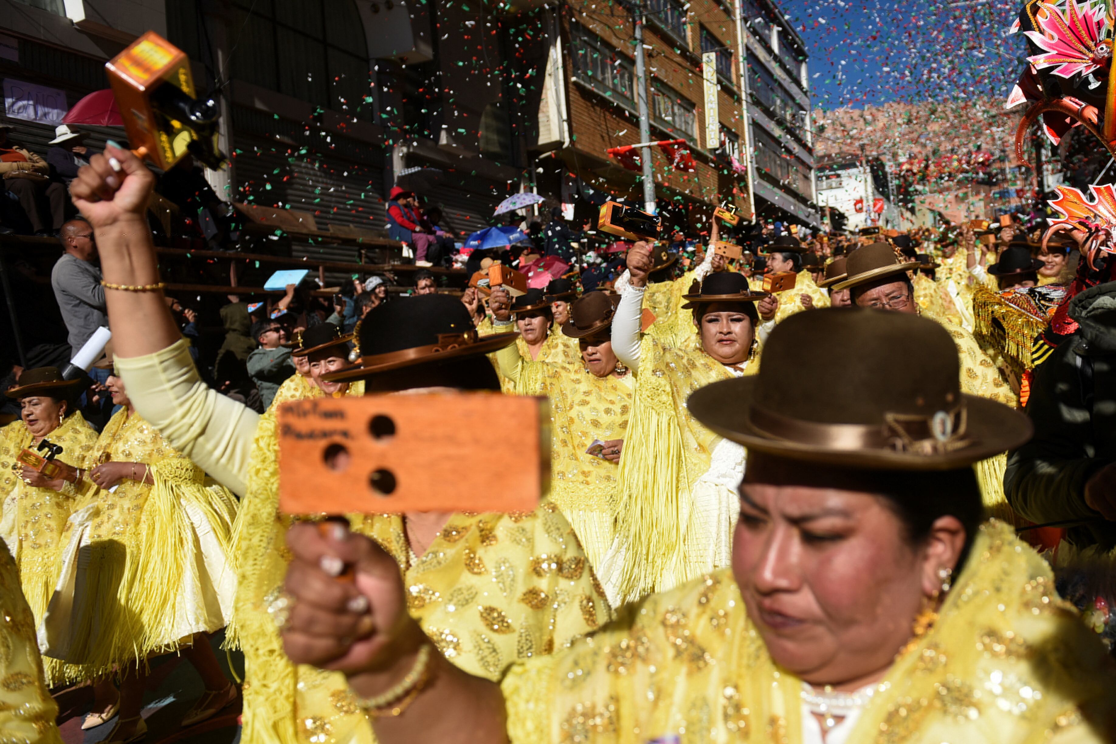 Dancers from the Morenada dance perform at the Folkloric Entrance of the "Lord of Great Power", a symbol of religious syncretism, which mixes Catholic traditions and Aymara customs, in La Paz, Bolivia May 25, 2024. REUTERS/Claudia Morales