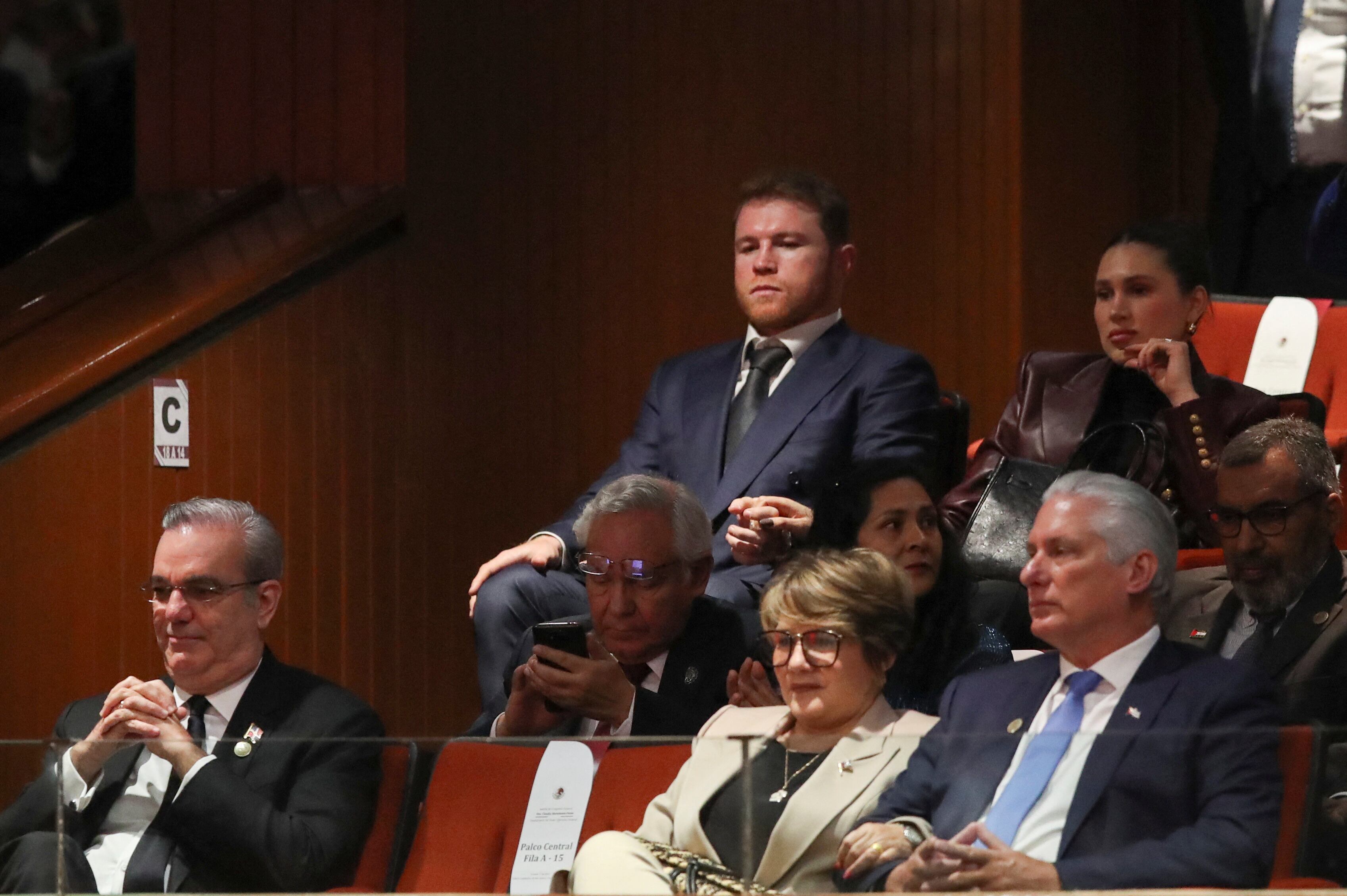 Cuban President Miguel Diaz-Canel and Mexican boxer Canelo Alvarez look on ahead of Mexico's President-elect Claudia Sheinbaum's swearing in ceremony, in Mexico City, Mexico, October 1, 2024. REUTERS/Henry Romero