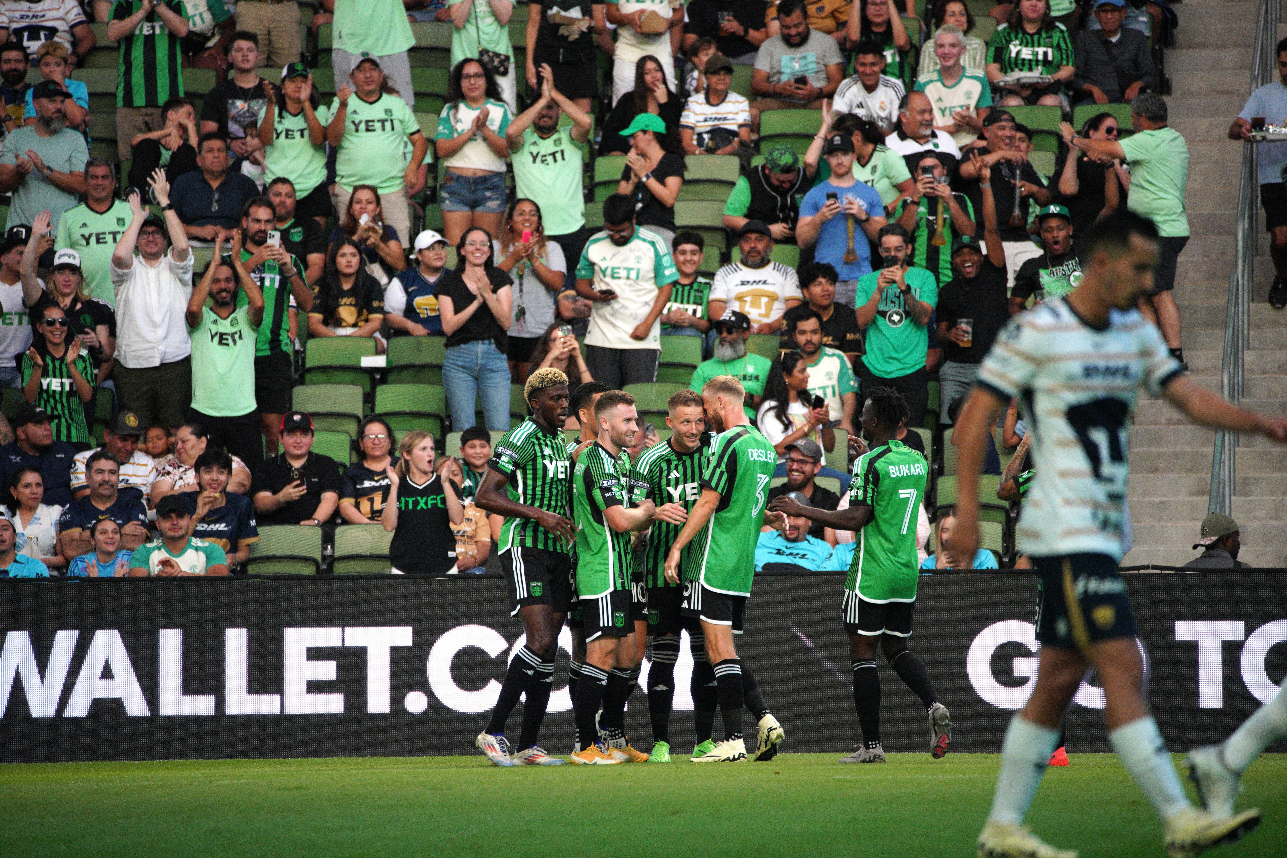 Jul 26, 2024; Austin, Texas, USA;  Austin FC celebrates a goal kick by midfielder Alex Ring (8) during the first half against Pumas UNAM at Q2 Stadium. Mandatory Credit: Dustin Safranek-USA TODAY Sports