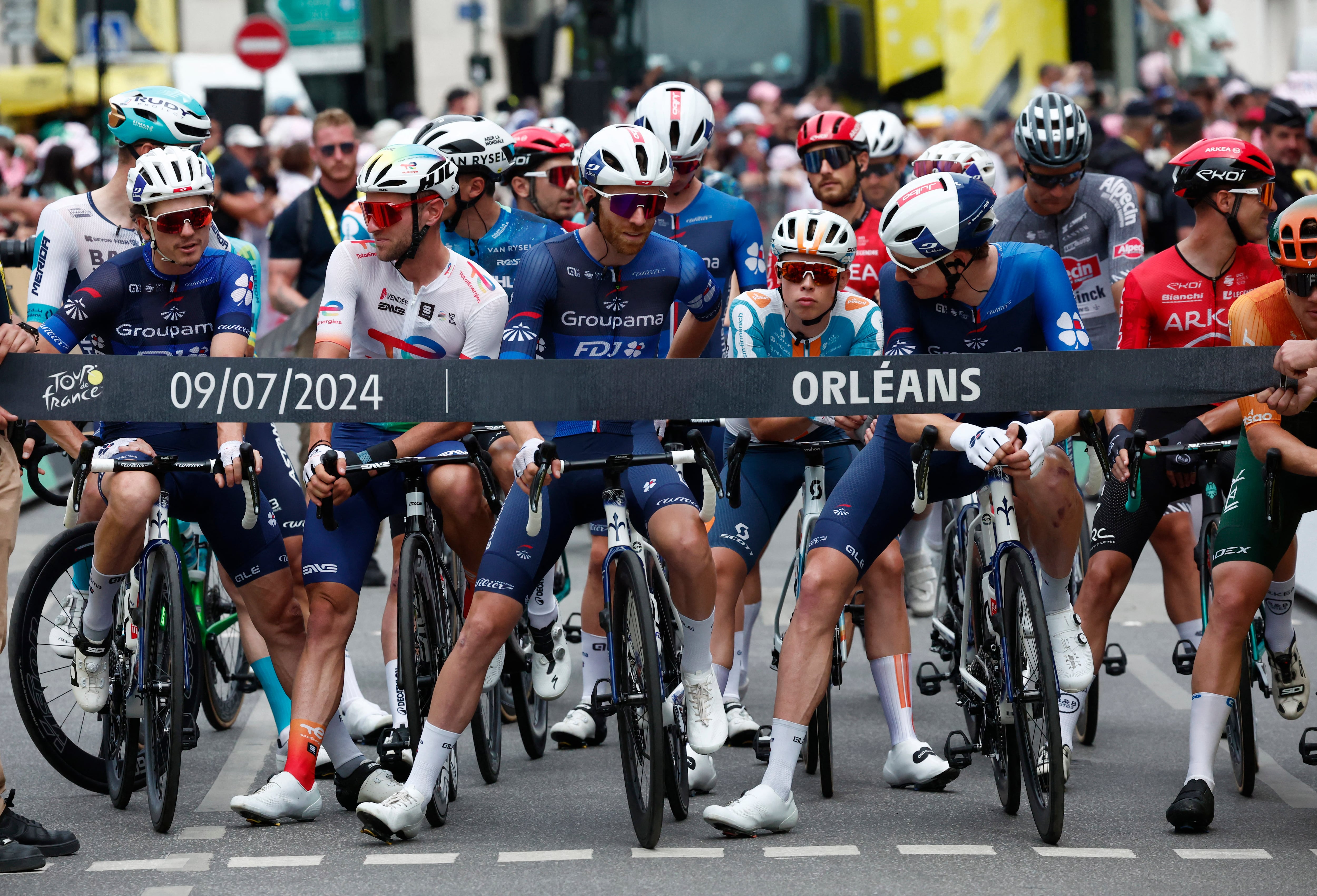 Cycling - Tour de France - Stage 10 - Orleans to Saint-Amand-Montrond - Orleans, France - July 9, 2024 Groupama - FDJ's David Gaudu and Quentin Pacher with riders before the start of stage 10 REUTERS/Stephane Mahe